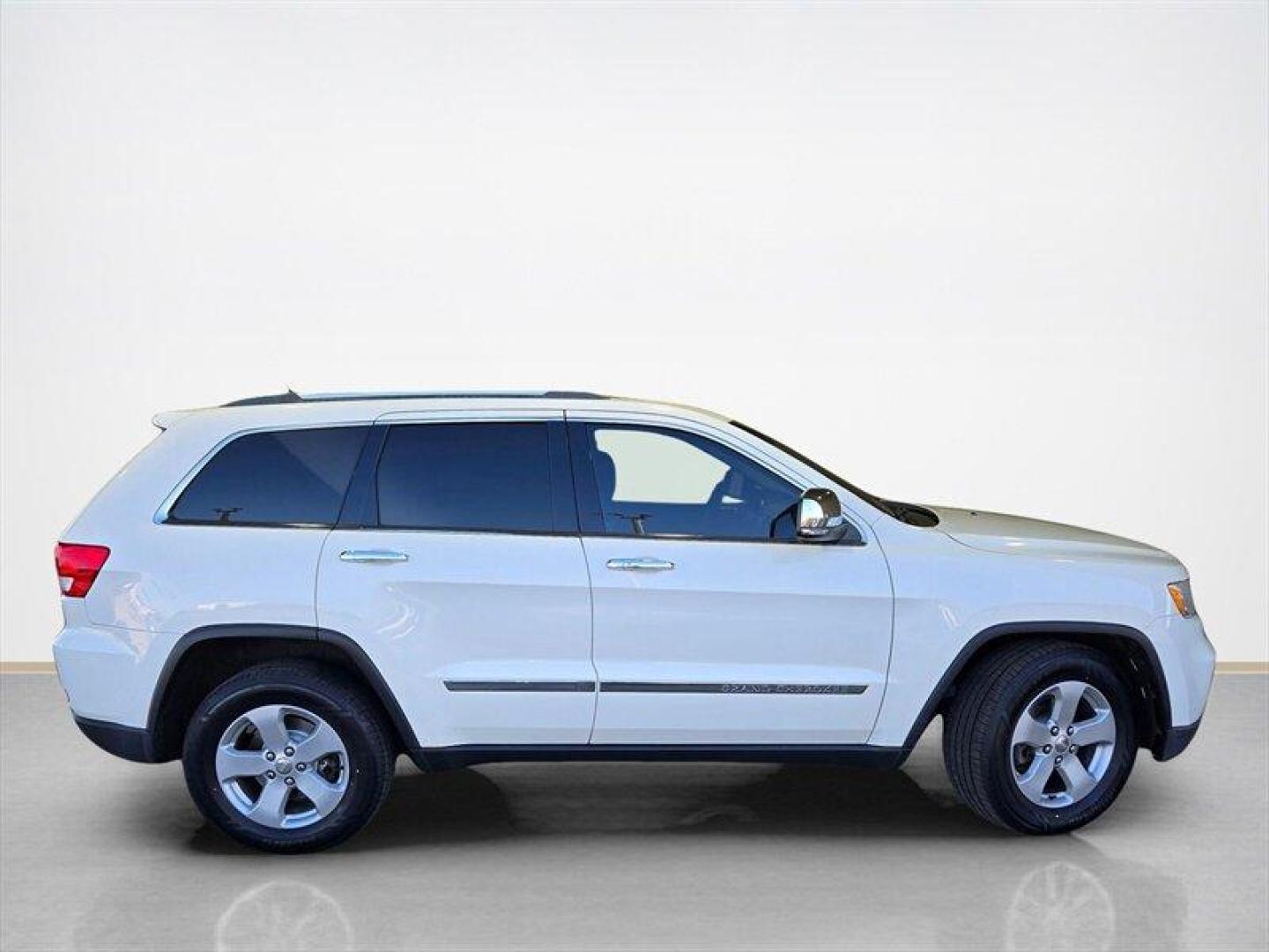 2012 Stone White Clear Coat Jeep Grand Cherokee Limited (1C4RJFBG1CC) with an 3.6L V6 290hp 260ft. lbs. engine, Automatic transmission, located at 25355 Eames Street, Channahon, IL, 60410, (815) 467-1807, 41.429108, -88.228432 - Introducing the 2012 Jeep Grand Cherokee Limited, a versatile SUV that combines rugged capability with refined comfort. This model is powered by a robust 3.6L V6 engine, delivering an impressive 290 horsepower and 260 lb-ft of torque, ensuring a responsive driving experience whether you're navigatin - Photo#1