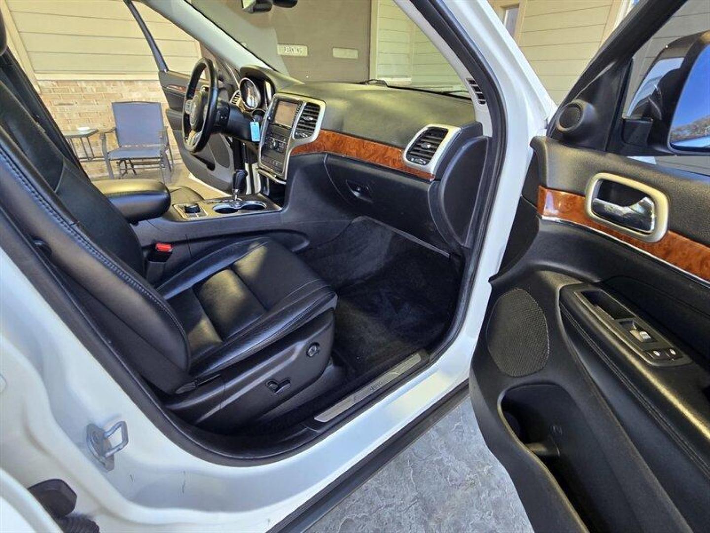 2012 Stone White Clear Coat Jeep Grand Cherokee Limited (1C4RJFBG1CC) with an 3.6L V6 290hp 260ft. lbs. engine, Automatic transmission, located at 25355 Eames Street, Channahon, IL, 60410, (815) 467-1807, 41.429108, -88.228432 - Introducing the 2012 Jeep Grand Cherokee Limited, a versatile SUV that combines rugged capability with refined comfort. This model is powered by a robust 3.6L V6 engine, delivering an impressive 290 horsepower and 260 lb-ft of torque, ensuring a responsive driving experience whether you're navigatin - Photo#26