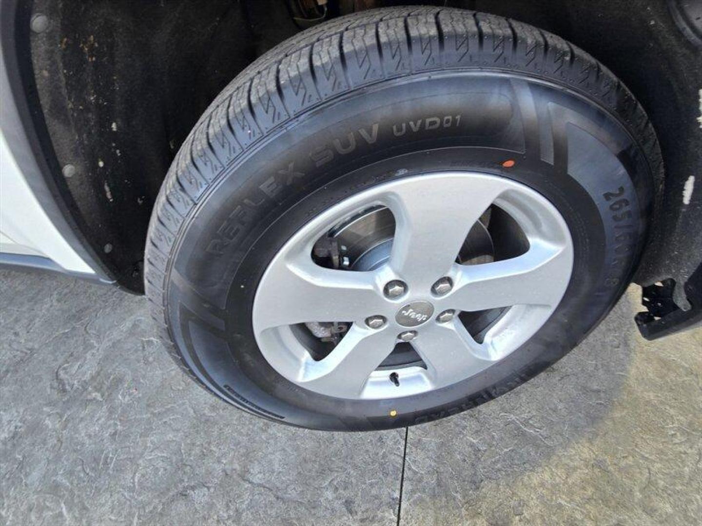 2012 Stone White Clear Coat Jeep Grand Cherokee Limited (1C4RJFBG1CC) with an 3.6L V6 290hp 260ft. lbs. engine, Automatic transmission, located at 25355 Eames Street, Channahon, IL, 60410, (815) 467-1807, 41.429108, -88.228432 - Introducing the 2012 Jeep Grand Cherokee Limited, a versatile SUV that combines rugged capability with refined comfort. This model is powered by a robust 3.6L V6 engine, delivering an impressive 290 horsepower and 260 lb-ft of torque, ensuring a responsive driving experience whether you're navigatin - Photo#27