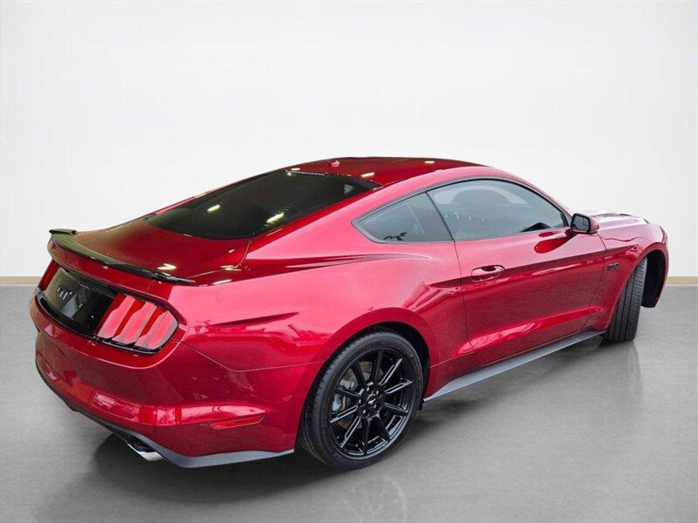 2016 Ruby Red Metallic Tinted Clearcoat Ford Mustang GT Premium (1FA6P8CF7G5) with an 5.0L V8 435hp 400ft. lbs. engine, 6 Speed Manual transmission, located at 25355 Eames Street, Channahon, IL, 60410, (815) 467-1807, 41.429108, -88.228432 - Get ready to unleash your inner speed demon with this 2016 Ford Mustang GT Premium, because this beauty isnt just a car; its a statement on wheels! Drenched in a head-turning Ruby Red Metallic Tinted Clearcoat, this Mustang is practically begging to be admired from every angle. Seriously, if looks c - Photo#3