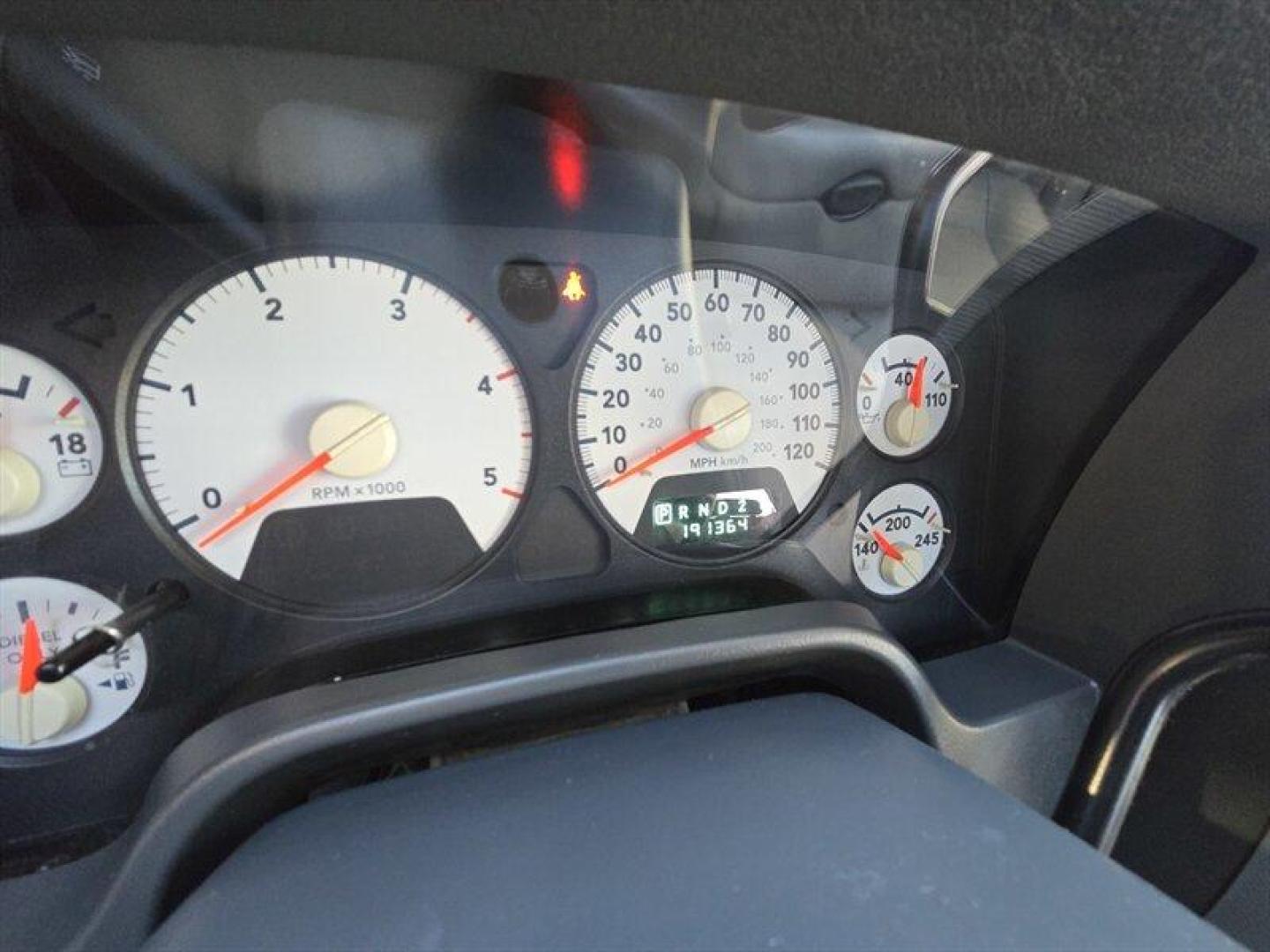 2006 Flame Red Clearcoat/Bright Silver Metallic Clearco Dodge Ram 2500 SLT (1D7KS28C26J) with an 5.9L Turbocharged Diesel I6 OHV 24V FI Engine engine, Automatic transmission, located at 25355 Eames Street, Channahon, IL, 60410, (815) 467-1807, 41.429108, -88.228432 - ** LOCAL TRADE IN, ARIZONA TRUCK. ** Introducing the 2006 Dodge Ram 2500 SLT, a robust and reliable workhorse designed to tackle your toughest tasks with ease. This truck is powered by a formidable 5.9L Turbocharged Diesel I6 OHV 24V FI Engine, delivering impressive torque and towing capacity, makin - Photo#12