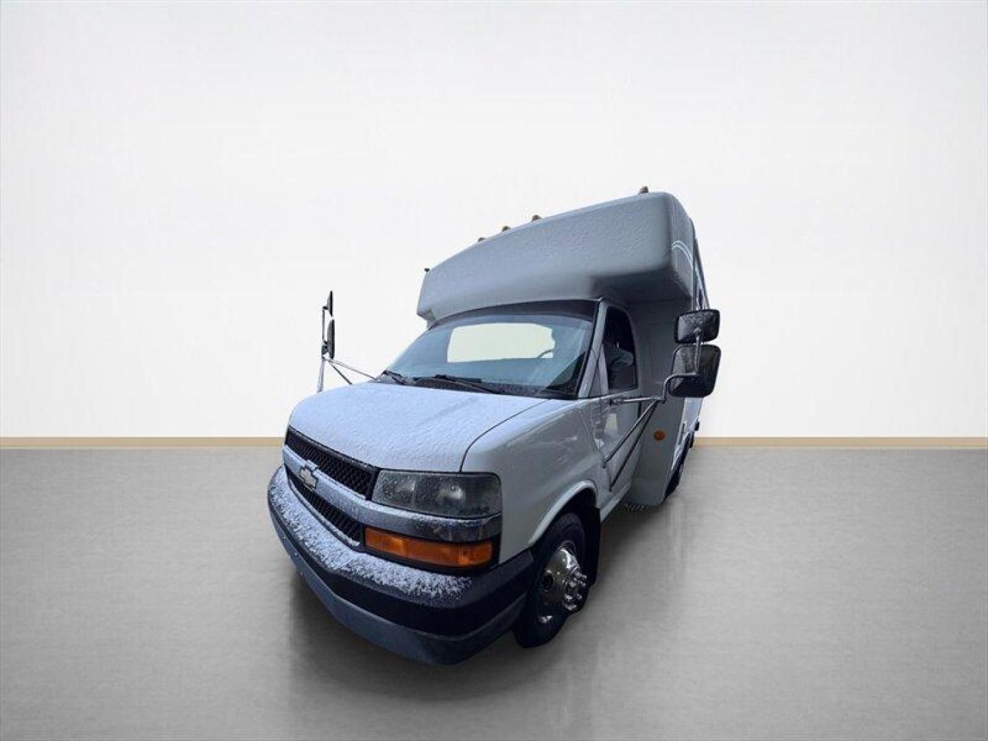 2004 White Chevrolet Express Base Cutaway (1GBJG31UX41) with an GM Vortec 6000 6.0L V8 345hp 380ft. lbs. engine, Automatic transmission, located at 25355 Eames Street, Channahon, IL, 60410, (815) 467-1807, 41.429108, -88.228432 - Introducing the 2004 Chevrolet Express 15 Passenger Bus the ultimate ride for those who love to roll deep! This beauty is powered by a robust 6.0L V8 engine, which means youll have all the muscle you need to haul your crew around town or across the country. With just under 57,000 miles on the clock - Photo#7