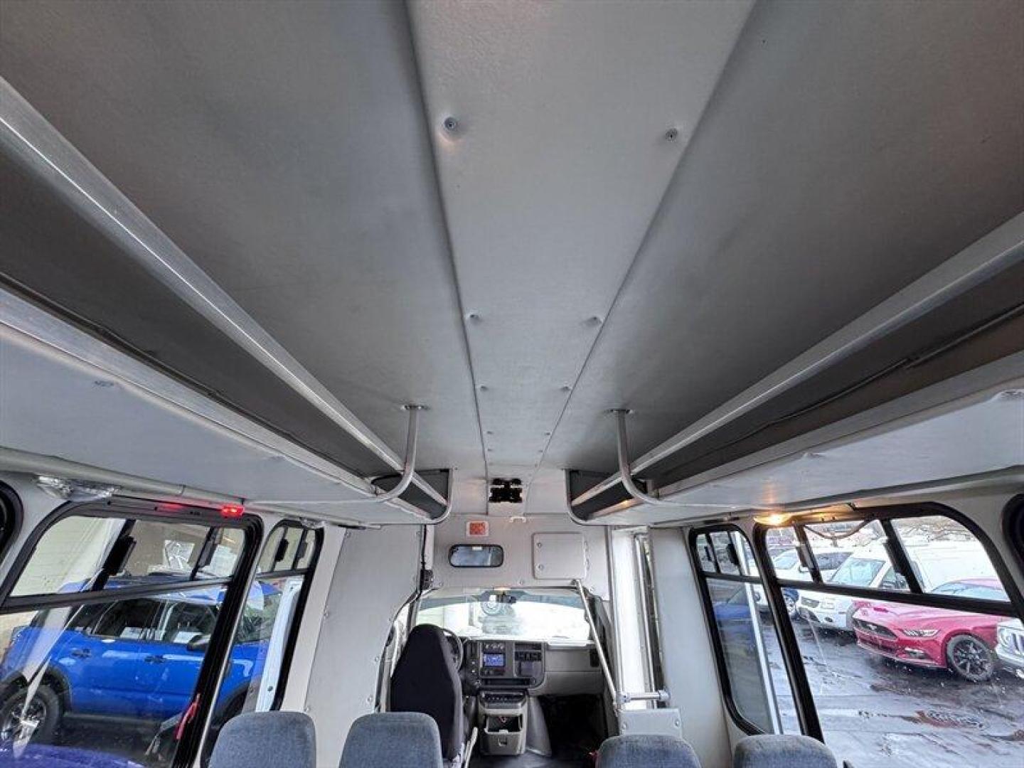 2004 White Chevrolet Express Base Cutaway (1GBJG31UX41) with an GM Vortec 6000 6.0L V8 345hp 380ft. lbs. engine, Automatic transmission, located at 25355 Eames Street, Channahon, IL, 60410, (815) 467-1807, 41.429108, -88.228432 - Introducing the 2004 Chevrolet Express 15 Passenger Bus the ultimate ride for those who love to roll deep! This beauty is powered by a robust 6.0L V8 engine, which means youll have all the muscle you need to haul your crew around town or across the country. With just under 57,000 miles on the clock - Photo#17