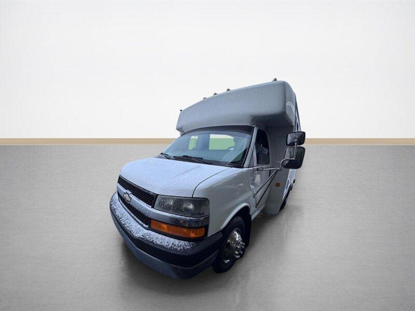 2004 White Chevrolet Express Base Cutaway (1GBJG31UX41) with an 6.0 engine, Automatic transmission, located at 25355 Eames Street, Channahon, IL, 60410, (815) 467-1807, 41.429108, -88.228432 - Introducing the 2004 Chevrolet Express 15 Passenger Bus the ultimate ride for those who love to roll deep! This beauty is powered by a robust 6.0L V8 engine, which means youll have all the muscle you need to haul your crew around town or across the country. With just under 57,000 miles on the clock - Photo#7