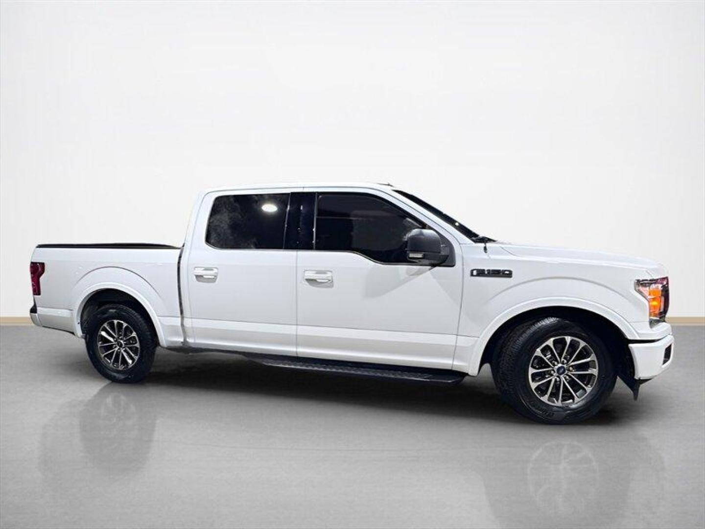2019 Oxford White Ford F-150 XLT (1FTEW1E55KF) with an 5.0L Flex Fuel V8 395hp 400ft. lbs. engine, Automatic transmission, located at 25355 Eames Street, Channahon, IL, 60410, (815) 467-1807, 41.429108, -88.228432 - This 2019 Ford F-150 didnt come to blend init came to make an entrance. Equipped with the FX4 package, this truck means business on and off the pavement, but the real attitude shows up the second you hear it fire up. Thanks to an aftermarket lowering kit and a fierce-sounding exhaust, this F-150 sit - Photo#1