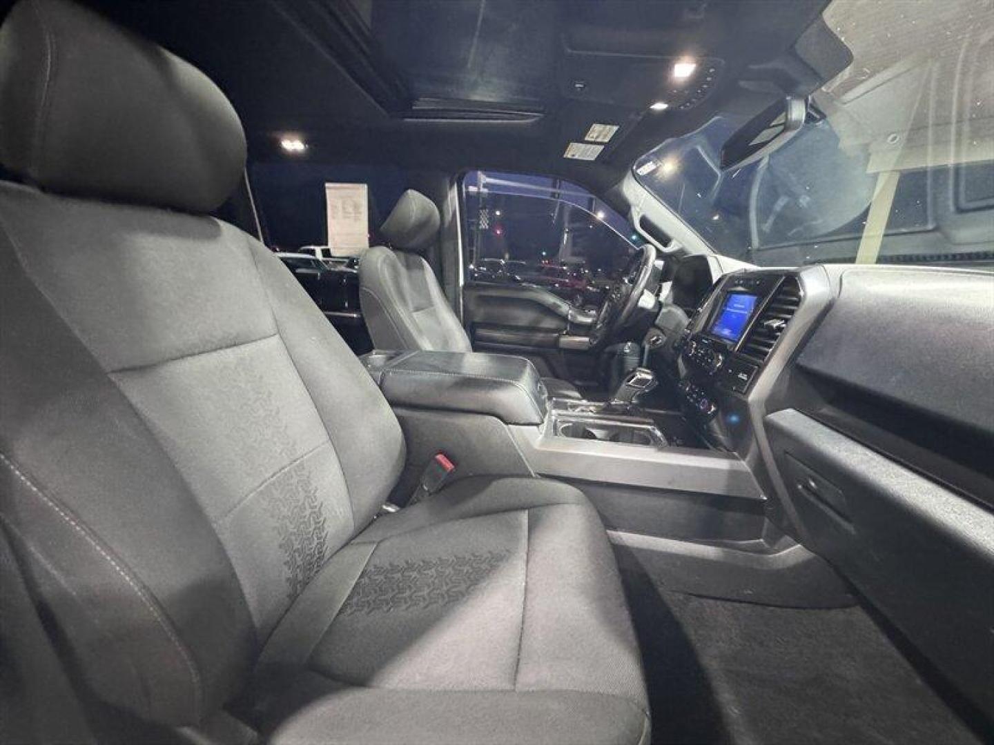 2019 Oxford White Ford F-150 XLT (1FTEW1E55KF) with an 5.0L Flex Fuel V8 395hp 400ft. lbs. engine, Automatic transmission, located at 25355 Eames Street, Channahon, IL, 60410, (815) 467-1807, 41.429108, -88.228432 - This 2019 Ford F-150 didnt come to blend init came to make an entrance. Equipped with the FX4 package, this truck means business on and off the pavement, but the real attitude shows up the second you hear it fire up. Thanks to an aftermarket lowering kit and a fierce-sounding exhaust, this F-150 sit - Photo#14