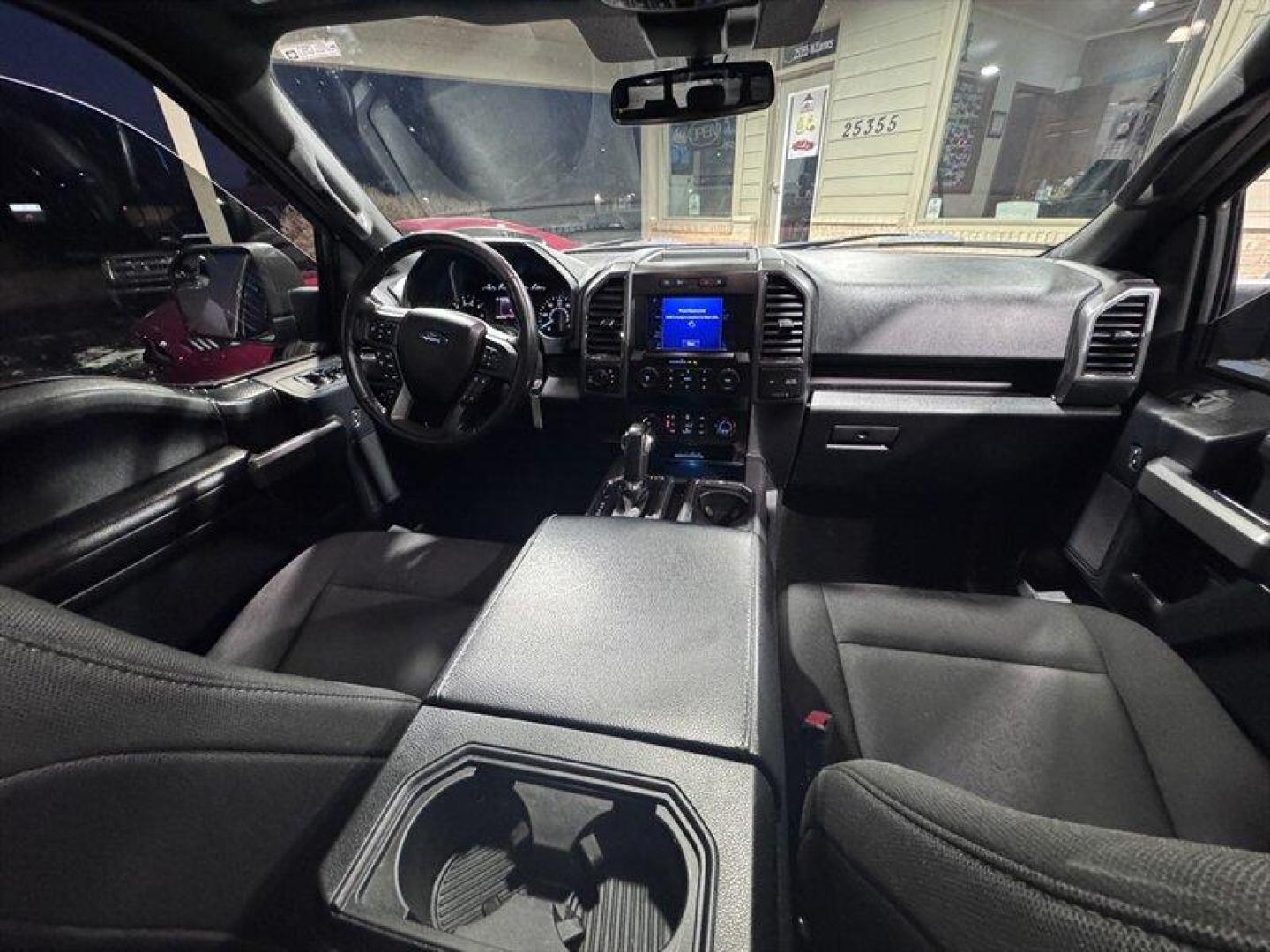 2019 Oxford White Ford F-150 XLT (1FTEW1E55KF) with an 5.0L Flex Fuel V8 395hp 400ft. lbs. engine, Automatic transmission, located at 25355 Eames Street, Channahon, IL, 60410, (815) 467-1807, 41.429108, -88.228432 - This 2019 Ford F-150 didnt come to blend init came to make an entrance. Equipped with the FX4 package, this truck means business on and off the pavement, but the real attitude shows up the second you hear it fire up. Thanks to an aftermarket lowering kit and a fierce-sounding exhaust, this F-150 sit - Photo#15