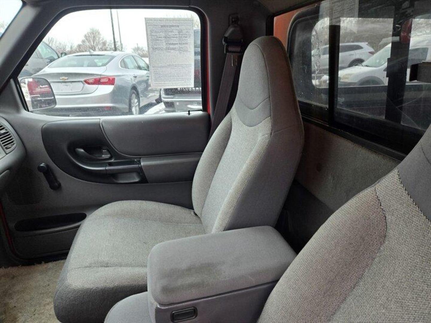 2000 Bright Red Clear Coat Ford Ranger XL (1FTYR10C8YP) with an 2.5L I4 119hp 146ft. lbs. engine, Automatic transmission, located at 25355 Eames Street, Channahon, IL, 60410, (815) 467-1807, 41.429108, -88.228432 - ** LOCAL TRADE IN, WHOLESALE AS-IS SPECIAL. HAS SOME RUST AND THE HOOD RELEASE CABLE IS BROKE.**Introducing the 2000 Ford Ranger XL, a reliable compact pickup that combines functionality with efficiency. Powered by a robust 2.5L I4 engine, this Ranger delivers a respectable 119 horsepower and 146 ft - Photo#14