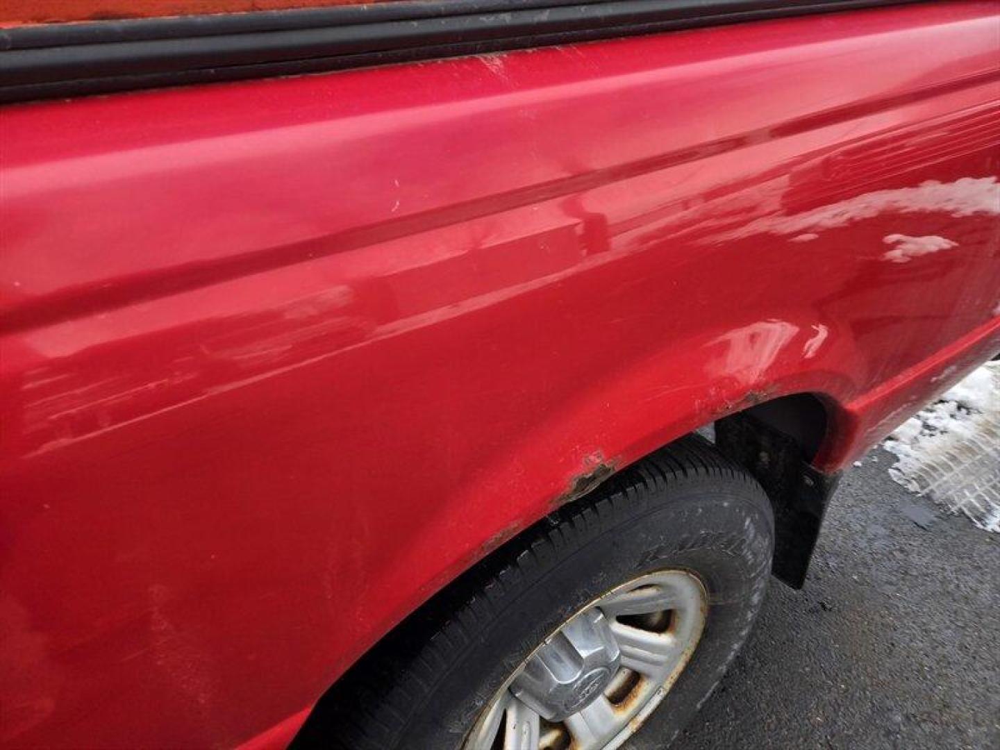 2000 Bright Red Clear Coat Ford Ranger XL (1FTYR10C8YP) with an 2.5L I4 119hp 146ft. lbs. engine, Automatic transmission, located at 25355 Eames Street, Channahon, IL, 60410, (815) 467-1807, 41.429108, -88.228432 - ** LOCAL TRADE IN, WHOLESALE AS-IS SPECIAL. HAS SOME RUST AND THE HOOD RELEASE CABLE IS BROKE.**Introducing the 2000 Ford Ranger XL, a reliable compact pickup that combines functionality with efficiency. Powered by a robust 2.5L I4 engine, this Ranger delivers a respectable 119 horsepower and 146 ft - Photo#15