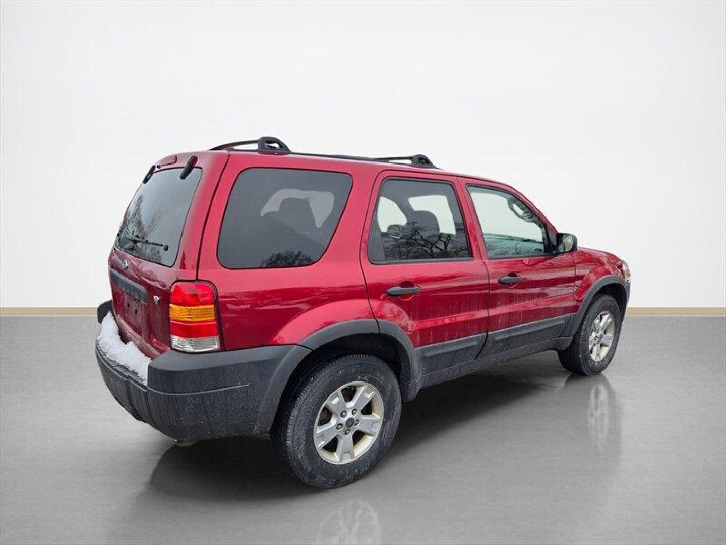 2006 Redfire Clearcoat Metallic Ford Escape XLT Sport (1FMCU93116K) with an 3.0L NA V6 double overhead cam (DOHC) 24V engine, Automatic transmission, located at 25355 Eames Street, Channahon, IL, 60410, (815) 467-1807, 41.429108, -88.228432 - ** LOCAL TRADE IN, WHOLESALE AS-IS SPECIAL, HAS SOME RUST. **Introducing the 2006 Ford Escape XLT, an ideal blend of functionality and style, perfect for both daily commutes and weekend adventures. This SUV is powered by a robust 3.0L NA V6 double overhead cam (DOHC) 24V engine, delivering a balance - Photo#3