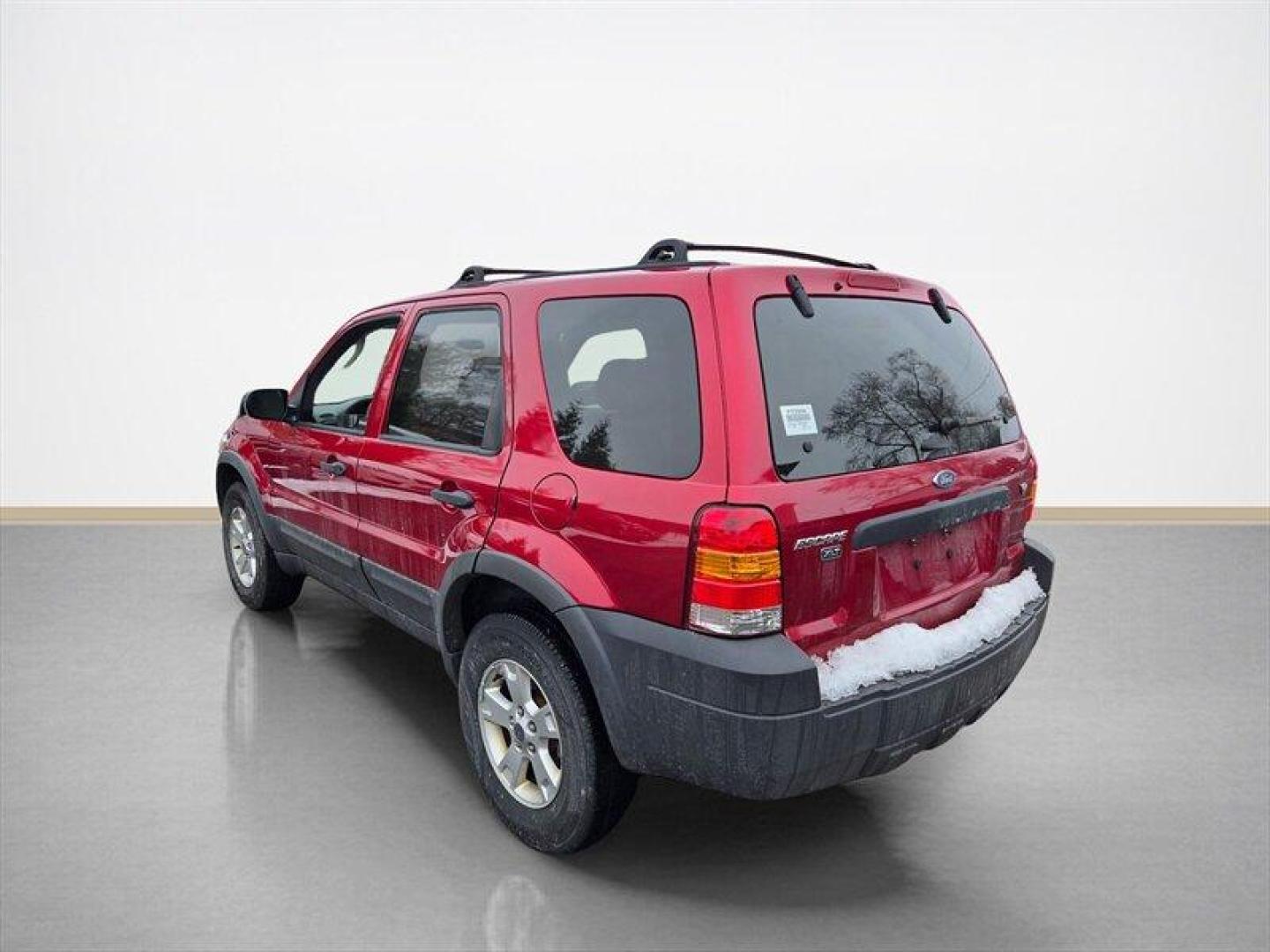 2006 Redfire Clearcoat Metallic Ford Escape XLT Sport (1FMCU93116K) with an 3.0L NA V6 double overhead cam (DOHC) 24V engine, Automatic transmission, located at 25355 Eames Street, Channahon, IL, 60410, (815) 467-1807, 41.429108, -88.228432 - ** LOCAL TRADE IN, WHOLESALE AS-IS SPECIAL, HAS SOME RUST. **Introducing the 2006 Ford Escape XLT, an ideal blend of functionality and style, perfect for both daily commutes and weekend adventures. This SUV is powered by a robust 3.0L NA V6 double overhead cam (DOHC) 24V engine, delivering a balance - Photo#5