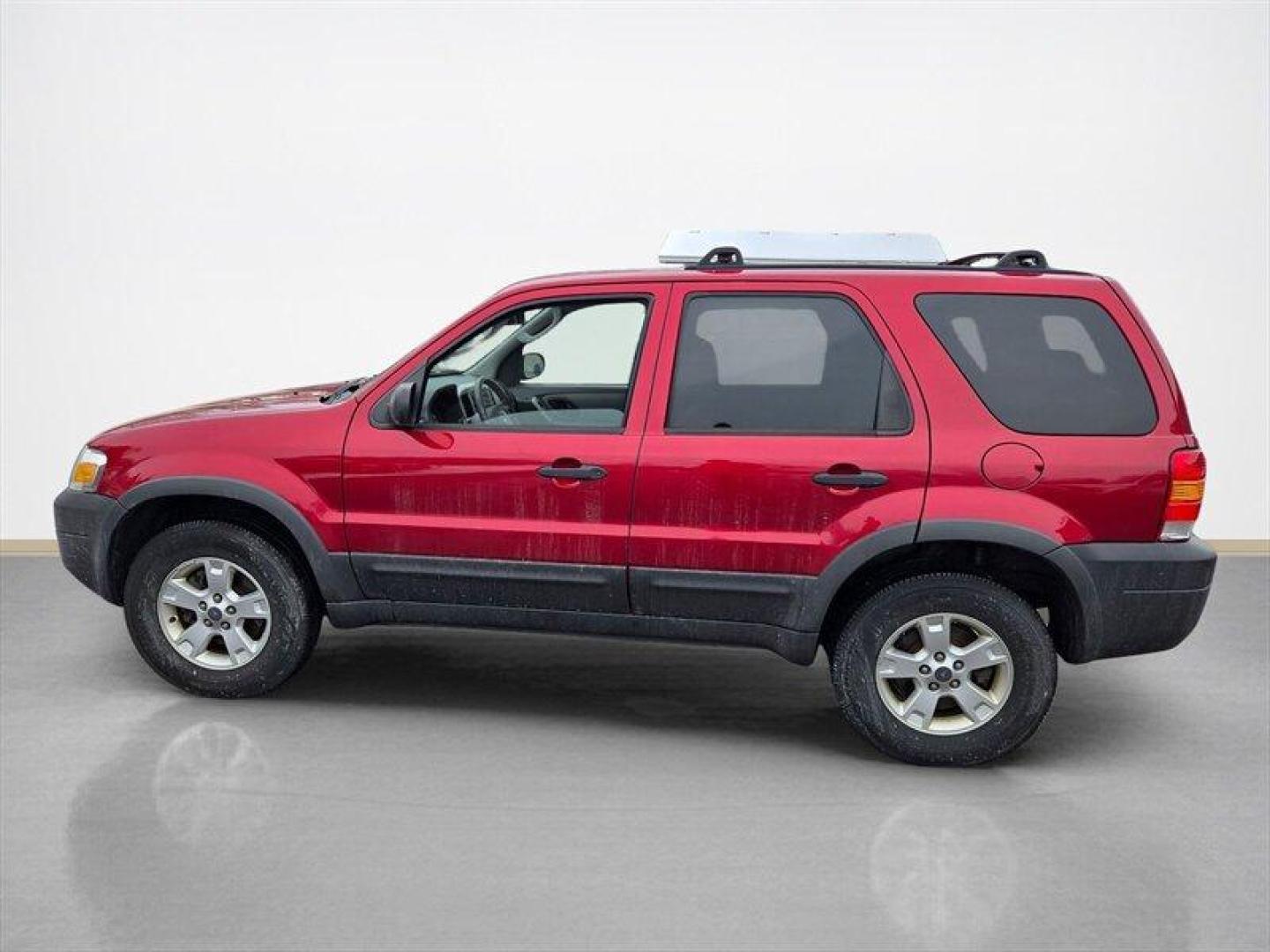 2006 Redfire Clearcoat Metallic Ford Escape XLT Sport (1FMCU93116K) with an 3.0L NA V6 double overhead cam (DOHC) 24V engine, Automatic transmission, located at 25355 Eames Street, Channahon, IL, 60410, (815) 467-1807, 41.429108, -88.228432 - ** LOCAL TRADE IN, WHOLESALE AS-IS SPECIAL, HAS SOME RUST. **Introducing the 2006 Ford Escape XLT, an ideal blend of functionality and style, perfect for both daily commutes and weekend adventures. This SUV is powered by a robust 3.0L NA V6 double overhead cam (DOHC) 24V engine, delivering a balance - Photo#6