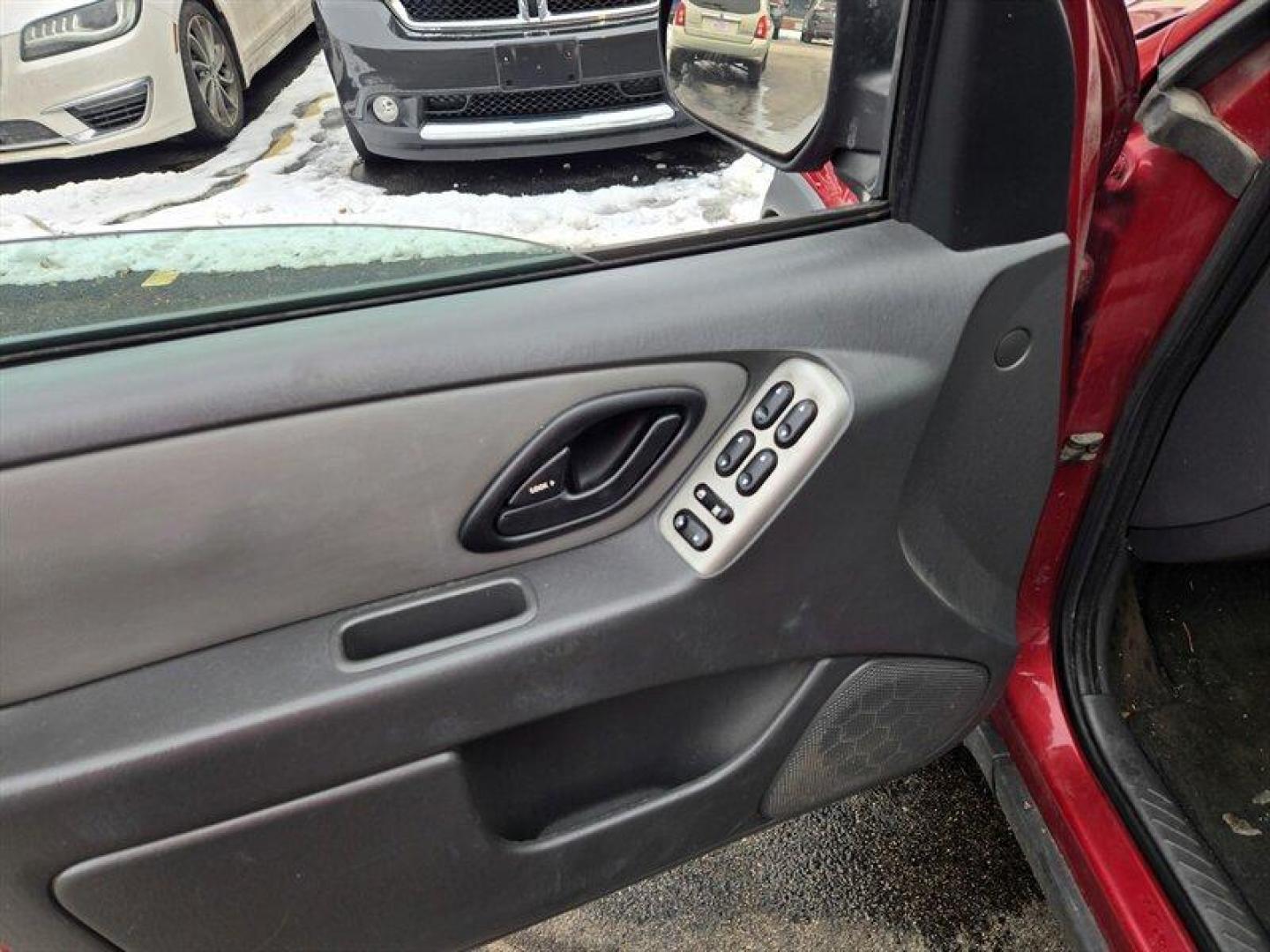 2006 Redfire Clearcoat Metallic Ford Escape XLT Sport (1FMCU93116K) with an 3.0L NA V6 double overhead cam (DOHC) 24V engine, Automatic transmission, located at 25355 Eames Street, Channahon, IL, 60410, (815) 467-1807, 41.429108, -88.228432 - ** LOCAL TRADE IN, WHOLESALE AS-IS SPECIAL, HAS SOME RUST. **Introducing the 2006 Ford Escape XLT, an ideal blend of functionality and style, perfect for both daily commutes and weekend adventures. This SUV is powered by a robust 3.0L NA V6 double overhead cam (DOHC) 24V engine, delivering a balance - Photo#10