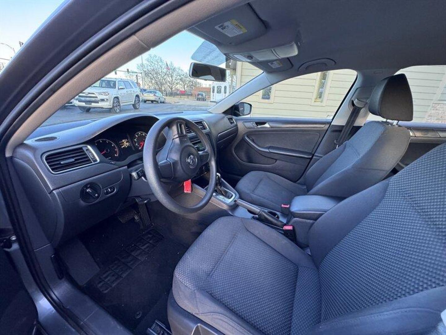 2014 Platinum Gray Metallic Volkswagen Jetta 2.0L S 2.0 (3VW2K7AJ8EM) with an 2.0L I4 115hp 125ft. lbs. engine, Automatic transmission, located at 25355 Eames Street, Channahon, IL, 60410, (815) 467-1807, 41.429108, -88.228432 - This 2014 Volkswagen Jetta S is a local trade that offers dependable transportation with a reputation for efficiency, comfort, and solid German engineering. Known for its smooth ride and roomy interior, the Jetta is a great choice for commuters, first-time drivers, or anyone looking for a practical - Photo#9