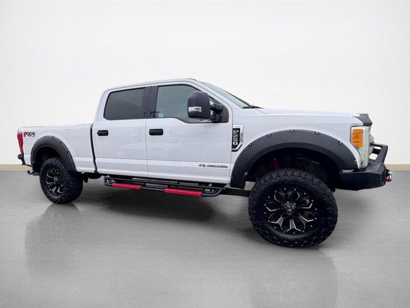 2017 Oxford White Ford F-250 XLT (1FT7W2BT2HE) with an Power Stroke 6.7L Biodiesel Turbo V8 440hp 925ft. engine, Automatic transmission, located at 25355 Eames Street, Channahon, IL, 60410, (815) 467-1807, 41.429108, -88.228432 - This 2017 Ford F-250 Crew Cab 4x4 Power Stroke Diesel is a local trade that commands attention the moment you see it. Built to work hard and stand out while doing it, this Super Duty combines legendary Ford diesel performance with aggressive aftermarket upgrades that set it apart from the rest. Und - Photo#1