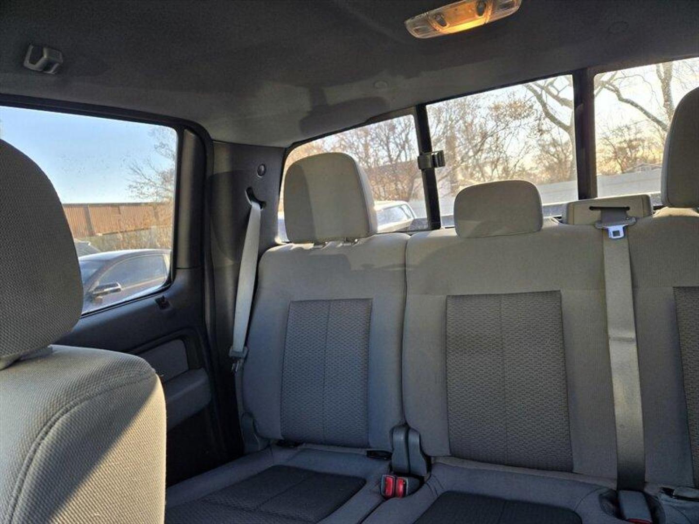 2013 Green Gem Metallic Ford F-150 XLT (1FTFW1EF5DF) with an 5.0L Flex Fuel V8 360hp 380ft. lbs. engine, Automatic transmission, located at 25355 Eames Street, Channahon, IL, 60410, (815) 467-1807, 41.429108, -88.228432 - This 2013 Ford F-150 Crew Cab 4x4 with the 5.0L V8 is a local trade being offered at a true wholesale price and is being sold AS IS / AS SHOWN. This truck is priced accordingly and is intended for a buyer who understands what an AS-IS wholesale vehicle means. The 5.0L V8 is known for strong perform - Photo#13