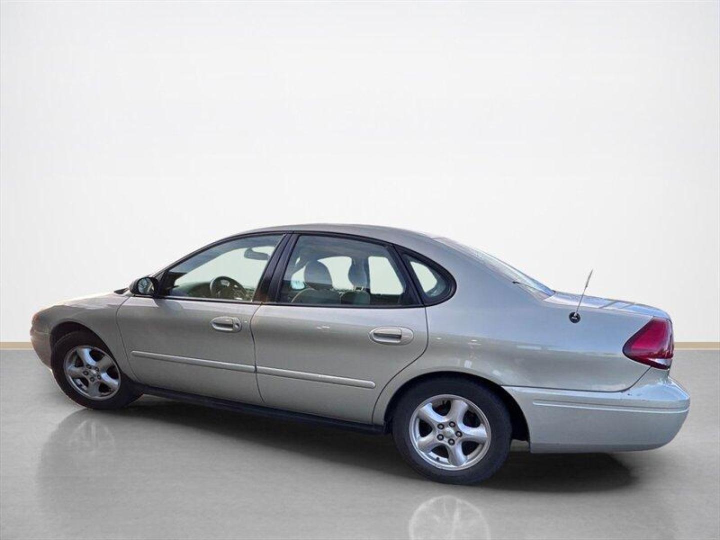 2004 Gold Ash Clearcoat Metallic Ford Taurus SE (1FAFP53U24G) with an 3.0L NA V6 overhead valves (OHV) 12V engine, Automatic transmission, located at 25355 Eames Street, Channahon, IL, 60410, (815) 467-1807, 41.429108, -88.228432 - 2004 Ford Taurus Local Trade One family ownedmother and sonfrom day one and well cared for over the years. Being sold AS IS, AS SHOWN with no inspection performed. CARFAX shows a total loss from hail damage in 2019, and the vehicle needs brakes and has steering noise. Priced with transparency for - Photo#6