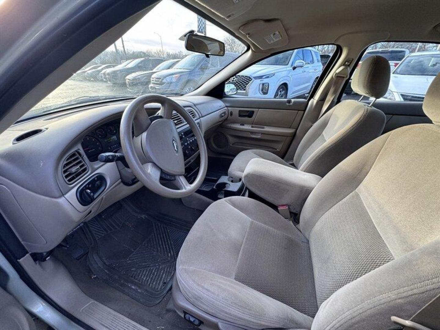 2004 Gold Ash Clearcoat Metallic Ford Taurus SE (1FAFP53U24G) with an 3.0L NA V6 overhead valves (OHV) 12V engine, Automatic transmission, located at 25355 Eames Street, Channahon, IL, 60410, (815) 467-1807, 41.429108, -88.228432 - 2004 Ford Taurus Local Trade One family ownedmother and sonfrom day one and well cared for over the years. Being sold AS IS, AS SHOWN with no inspection performed. CARFAX shows a total loss from hail damage in 2019, and the vehicle needs brakes and has steering noise. Priced with transparency for - Photo#11