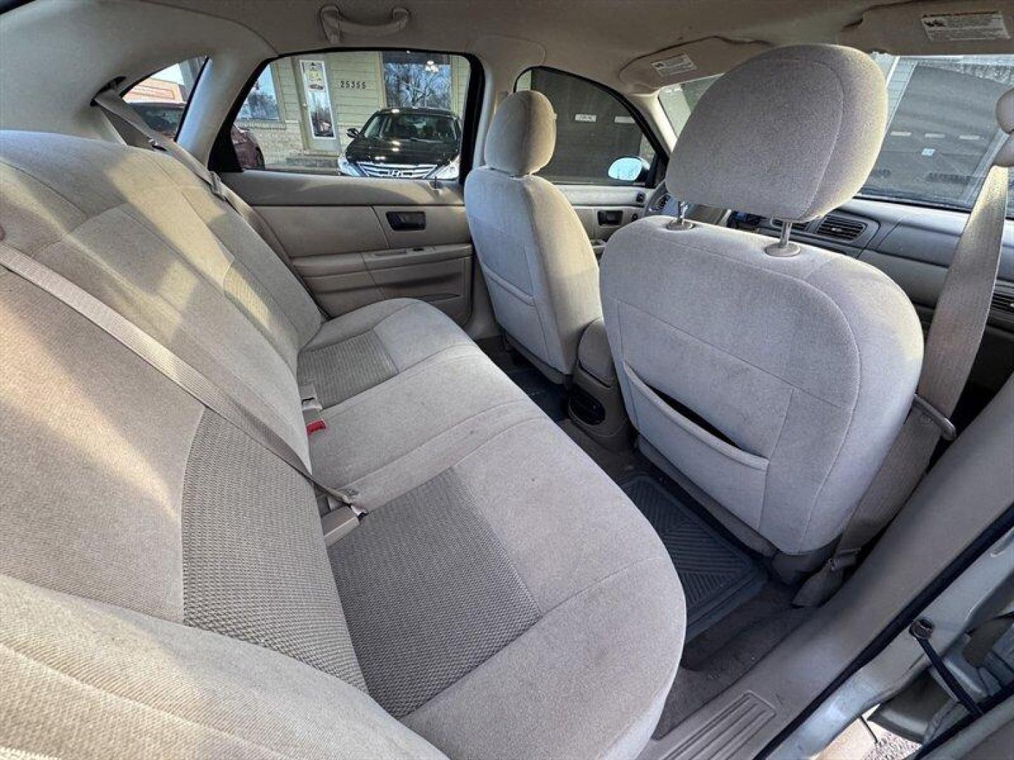 2004 Gold Ash Clearcoat Metallic Ford Taurus SE (1FAFP53U24G) with an 3.0L NA V6 overhead valves (OHV) 12V engine, Automatic transmission, located at 25355 Eames Street, Channahon, IL, 60410, (815) 467-1807, 41.429108, -88.228432 - 2004 Ford Taurus Local Trade One family ownedmother and sonfrom day one and well cared for over the years. Being sold AS IS, AS SHOWN with no inspection performed. CARFAX shows a total loss from hail damage in 2019, and the vehicle needs brakes and has steering noise. Priced with transparency for - Photo#13