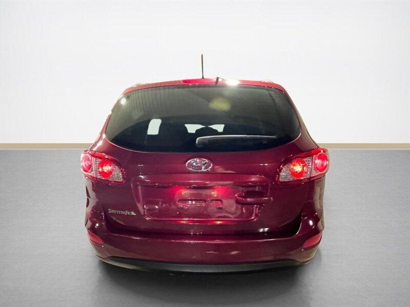 2012 Sierra Red Hyundai SANTA FE GLS (5XYZG3AB0CG) with an 2.4L I4 175hp 169ft. lbs. engine, Automatic transmission, located at 25355 Eames Street, Channahon, IL, 60410, (815) 467-1807, 41.429108, -88.228432 - 2012 Hyundai Santa Fe Local Trade Being sold AS IS, AS SHOWN and we are not inspecting this vehicle. A solid option for a first-time driver or commuter car looking for an affordable SUV. Price does not include taxes, title, registration, or documentation fees. - Photo#4