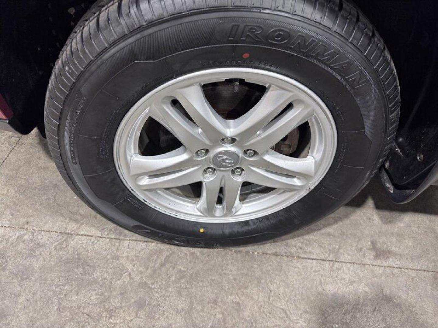 2012 Sierra Red Hyundai SANTA FE GLS (5XYZG3AB0CG) with an 2.4L I4 175hp 169ft. lbs. engine, Automatic transmission, located at 25355 Eames Street, Channahon, IL, 60410, (815) 467-1807, 41.429108, -88.228432 - 2012 Hyundai Santa Fe Local Trade Being sold AS IS, AS SHOWN and we are not inspecting this vehicle. A solid option for a first-time driver or commuter car looking for an affordable SUV. Price does not include taxes, title, registration, or documentation fees. - Photo#9