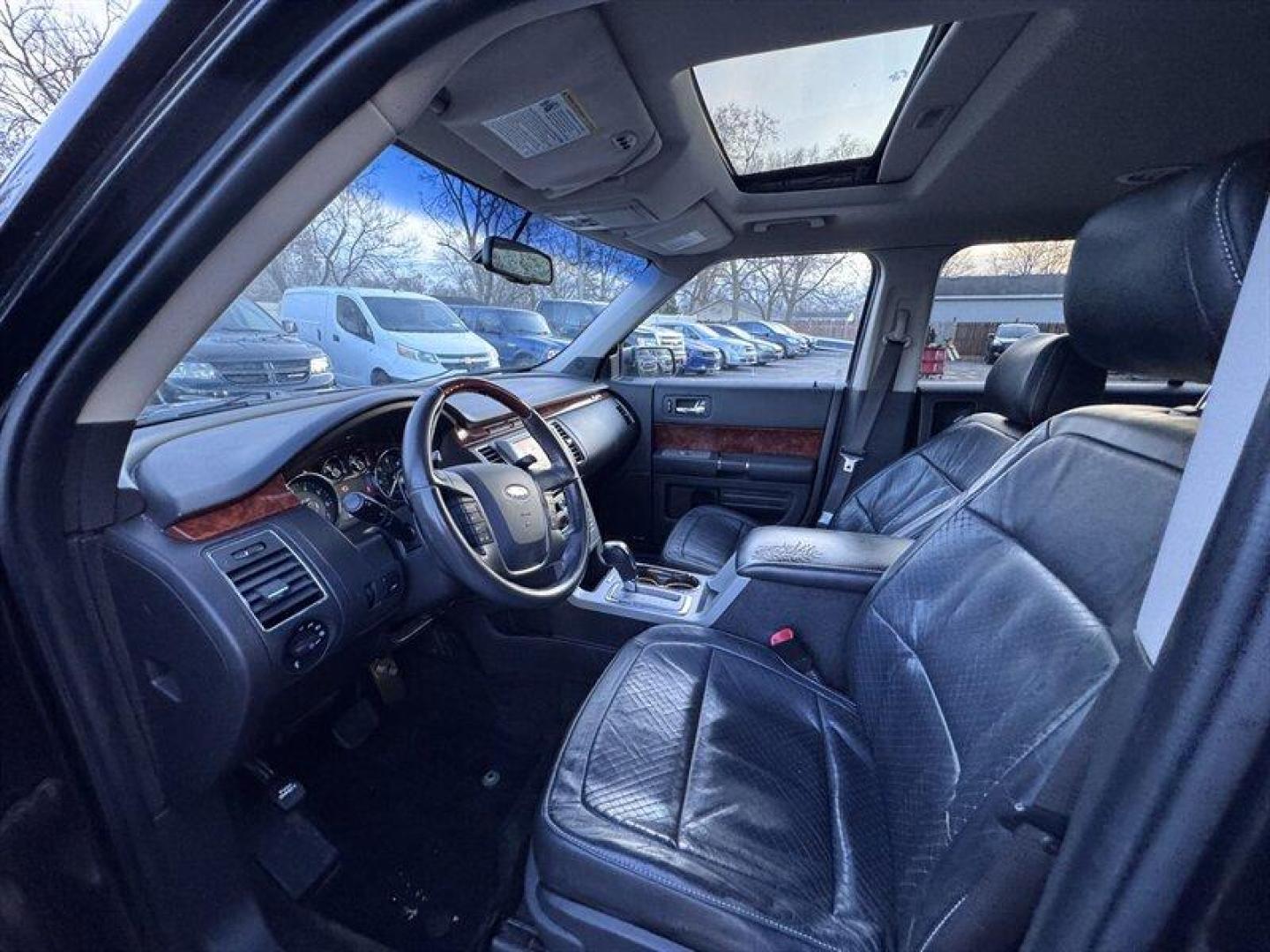 2012 Black Ford Flex Limited (2FMHK6DT2CB) with an EcoBoost 3.5L Twin Turbo V6 355hp 350ft. lbs. engine, Automatic transmission, located at 25355 Eames Street, Channahon, IL, 60410, (815) 467-1807, 41.429108, -88.228432 - This 2012 Ford Flex Limited is a local trade and comes loaded with bells and whistles. It offers heated leather seats, a sunroof, and 6-passenger seating, making it a comfortable and spacious option for family hauling or road trips. Please note, this vehicle is being sold as-is, as shown and we are - Photo#11