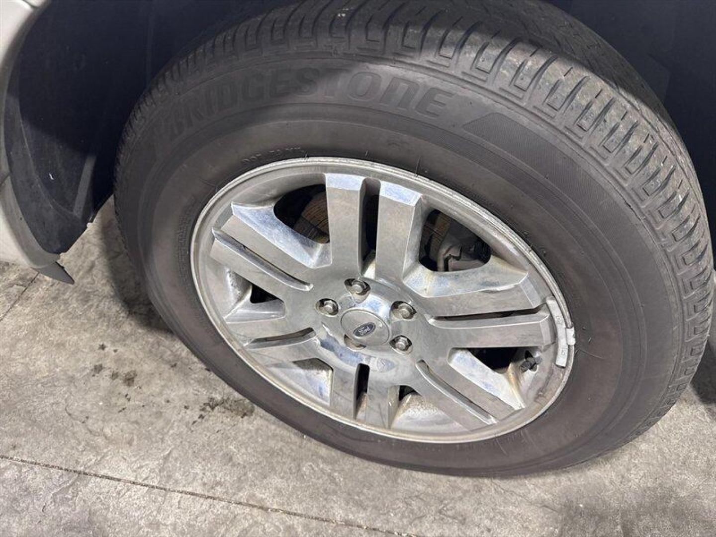 2007 Silver Ford Explorer Limited (1FMEU75817U) with an 4.6L V8 292hp 300ft. lbs. engine, Automatic transmission, located at 25355 Eames Street, Channahon, IL, 60410, (815) 467-1807, 41.429108, -88.228432 - This 2007 Ford Explorer Limited 4x4 is a local trade powered by the V8, offering solid capability and room for the whole crew. It comes equipped with heated leather seats, a sunroof, and 7-passenger seating, making it a well-optioned SUV for its age. Please note: this vehicle is being sold as-is, a - Photo#9