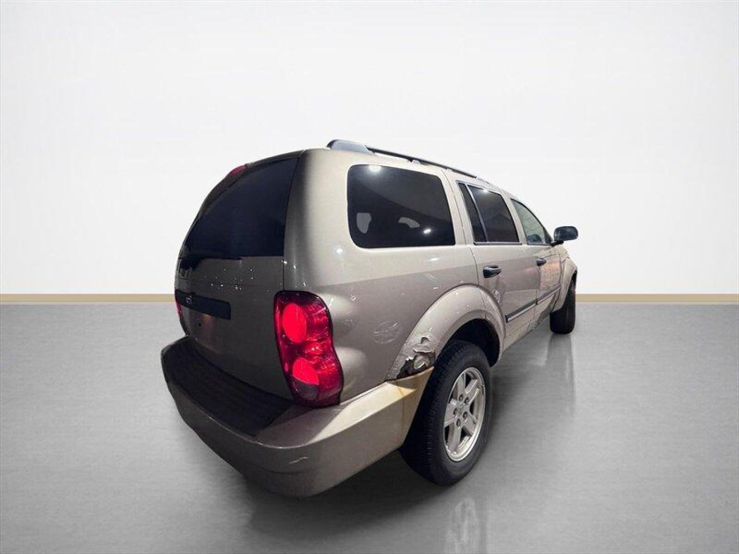 2008 Tan Dodge Durango SLT (1D8HB48N18F) with an Magnum 4.7L V8 303hp 330ft. lbs. engine, Automatic transmission, located at 25355 Eames Street, Channahon, IL, 60410, (815) 467-1807, 41.429108, -88.228432 - This 2008 Dodge Durango SLT 4x4 is a local trade that runs and drives and offers 7-passenger seating with the capability of 4x4 when you need it. Please note: the body is in rough shape, and this vehicle is being sold as-is, as shown. We are not inspecting it, and it is priced accordingly for someo - Photo#3