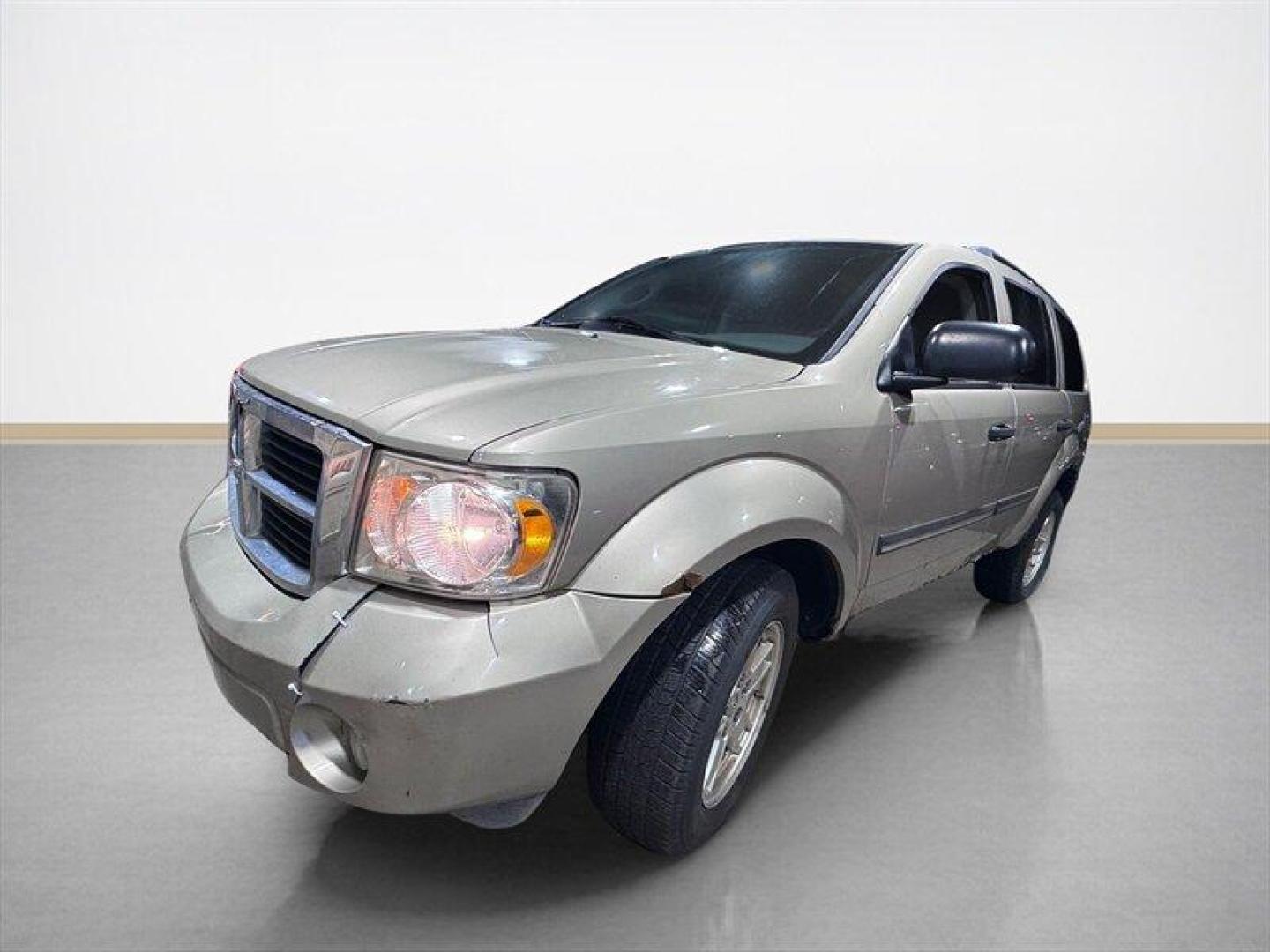 2008 Tan Dodge Durango SLT (1D8HB48N18F) with an Magnum 4.7L V8 303hp 330ft. lbs. engine, Automatic transmission, located at 25355 Eames Street, Channahon, IL, 60410, (815) 467-1807, 41.429108, -88.228432 - This 2008 Dodge Durango SLT 4x4 is a local trade that runs and drives and offers 7-passenger seating with the capability of 4x4 when you need it. Please note: the body is in rough shape, and this vehicle is being sold as-is, as shown. We are not inspecting it, and it is priced accordingly for someo - Photo#7