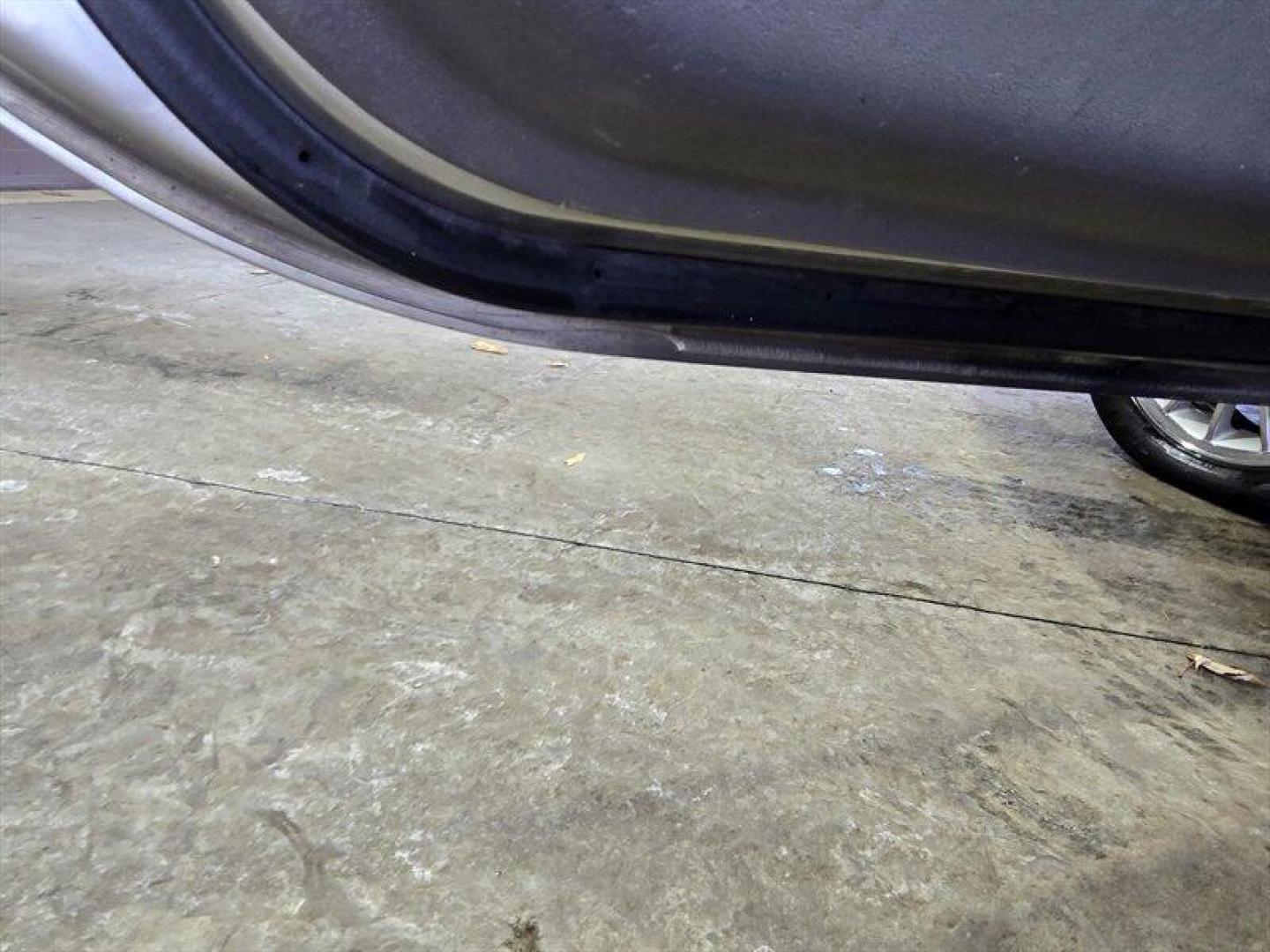 2005 Silver Beige Metallic Clearcoat Chrysler Sebring Limited (4C3AG52H45E) with an 3.0L NA V6 single overhead cam (SOHC) 24V engine, Automatic transmission, located at 25355 Eames Street, Channahon, IL, 60410, (815) 467-1807, 41.429108, -88.228432 - ** PURCHASED FROM AN ESTATE, ALL WE DID IS CLEAN IT, HAS LIGHT SCRAPE ON RIGHT SIDE, DASH IS ROLLING UP BY VENT, STILL HAS THE PLASTIC ON THE REAR SEATS. ** 2005 Chrysler Sebring Limited Silver Beige Metallic Clearcoat exterior with Dark Taupe/Medium Taupe interior. This example is powered by a 3.0 - Photo#35