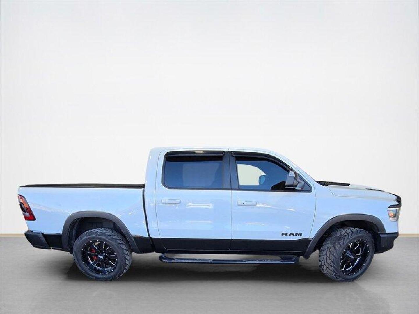 2019 Bright White Clear Coat/Diamond Black Crystal Pear RAM 1500 Rebel (1C6SRFLT0KN) with an HEMI 5.7L V8 395hp 410ft. lbs. engine, Automatic transmission, located at 25355 Eames Street, Channahon, IL, 60410, (815) 467-1807, 41.429108, -88.228432 - 2019 RAM 1500 Rebel Engine and performance This Rebel is powered by the factory HEMI 5.7L V8 producing 395 hp and 410 lb-ft of torque, paired with an 8-speed automatic transmission. It is factory-equipped for off-road use with four-wheel drive and Rebel-specific suspension tuning that includes monot - Photo#1