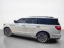 2018 White Platinum Tri-Coat Lincoln Navigator Reserve (5LMJJ2LT0JE) with an 3.5L Twin Turbo V6 450hp 510ft. lbs. engine, Automatic transmission, located at 25355 Eames Street, Channahon, IL, 60410, (815) 467-1807, 41.429108, -88.228432 - Pull up like you own the place. The 2018 Lincoln Navigator Reserve brings full boss energy with luxury to match. Cooled seats when summers rude. Heated leather when winter tries you. Panoramic roof for the views. Backup camera, nav, remote start, power boards all the bells, zero compromises. Whit - Photo#6