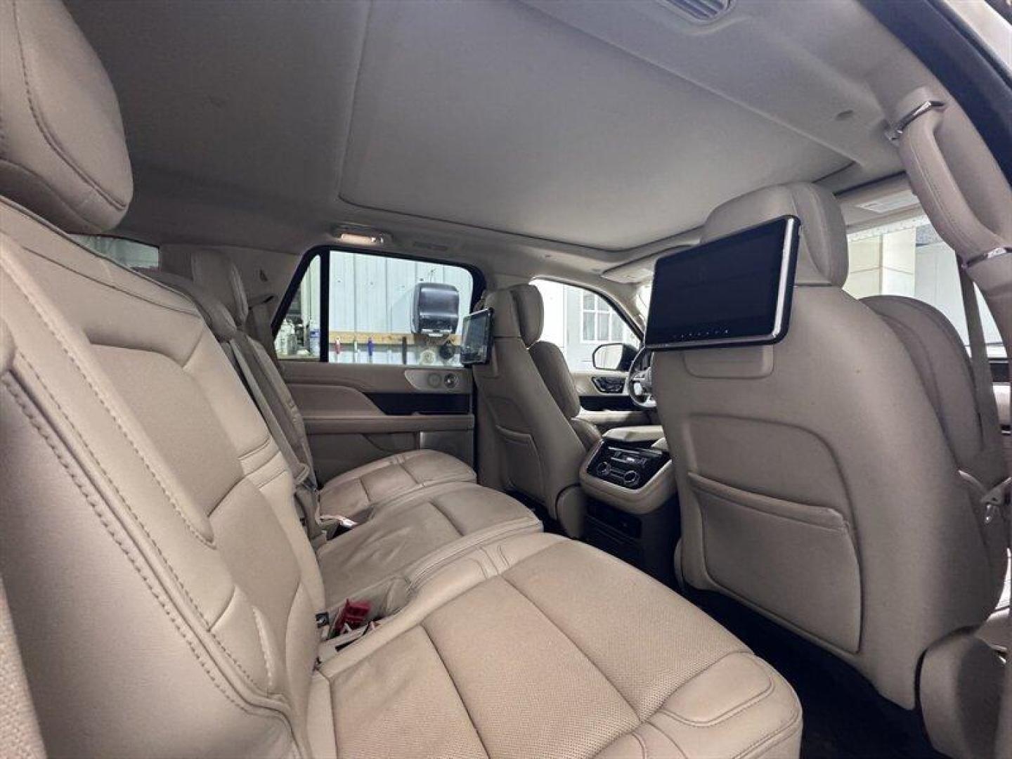 2018 White Platinum Tri-Coat Lincoln Navigator Reserve (5LMJJ2LT0JE) with an 3.5L Twin Turbo V6 450hp 510ft. lbs. engine, Automatic transmission, located at 25355 Eames Street, Channahon, IL, 60410, (815) 467-1807, 41.429108, -88.228432 - Pull up like you own the place. The 2018 Lincoln Navigator Reserve brings full boss energy with luxury to match. Cooled seats when summers rude. Heated leather when winter tries you. Panoramic roof for the views. Backup camera, nav, remote start, power boards all the bells, zero compromises. Whit - Photo#12