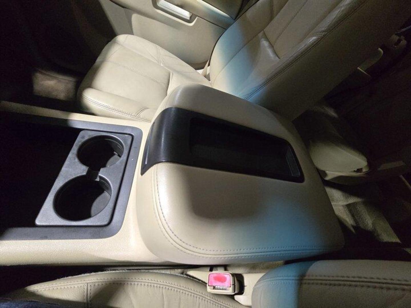 2010 Summit White GMC Yukon SLT (1GKMCCE34AR) with an Vortec Aluminum Block 5.3L Flex Fuel V8 320hp 335f engine, Automatic transmission, located at 25355 Eames Street, Channahon, IL, 60410, (815) 467-1807, 41.429108, -88.228432 - 2010 GMC Yukon SLT XFE Summit White exterior, Light Tan interior. This Yukon is powered by the Vortec aluminum-block 5.3L FlexFuel V8 (320 hp, 335 lb-ft torque) paired with a six-speed automatic transmission. It carries the XFE (extra fuel economy) calibration from the factory to improve highway ef - Photo#21