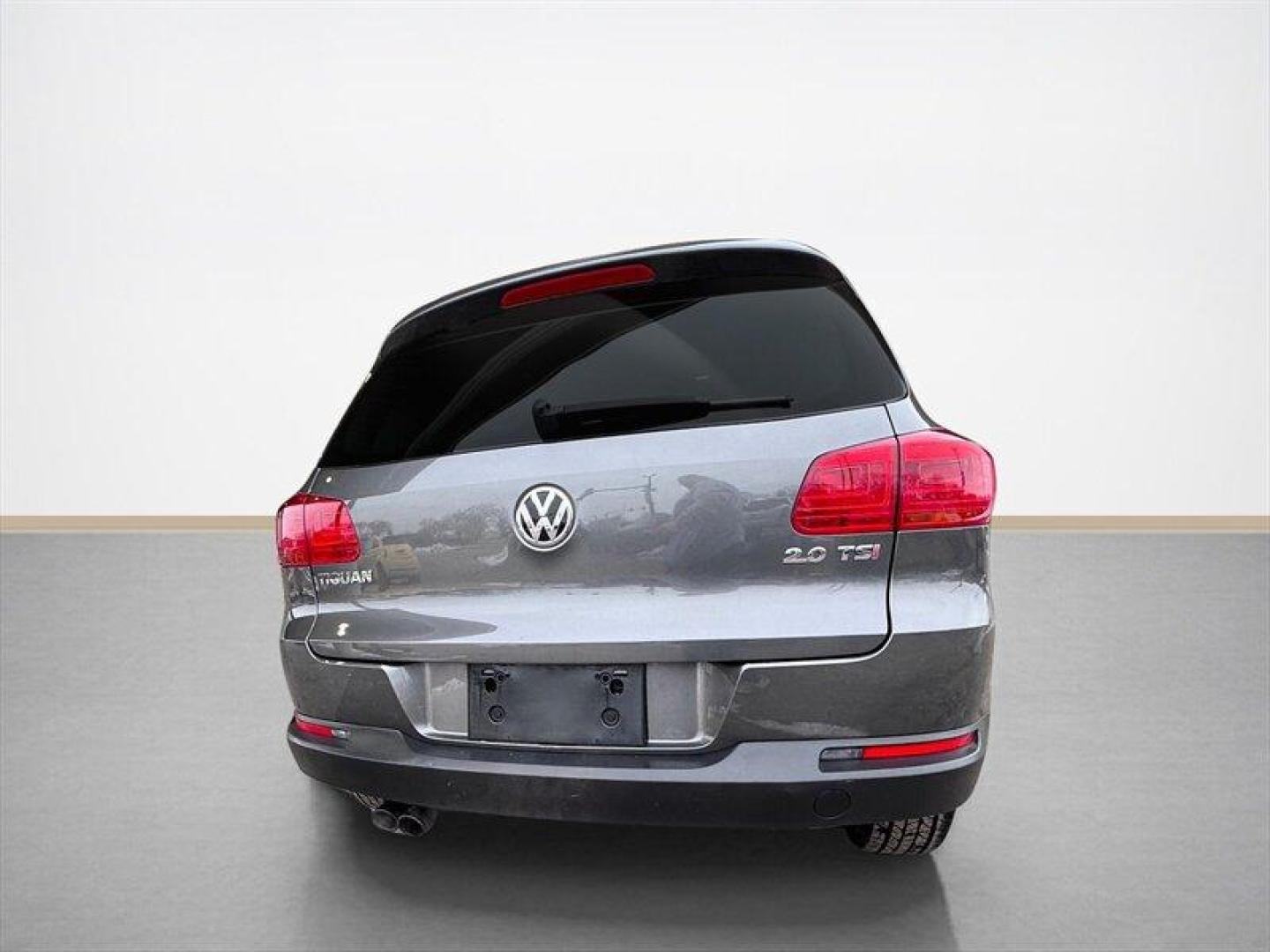 2013 Pepper Gray Volkswagen Tiguan S (WVGAV3AX9DW) with an 2.0L Turbo I4 200hp 207ft. lbs. engine, TipTronic transmission, located at 25355 Eames Street, Channahon, IL, 60410, (815) 467-1807, 41.429108, -88.228432 - 2013 Volkswagen Tiguan S compact, turbocharged, and still flirting with the open road. Under the hood sits VWs peppy 2.0L Turbo I4 pushing a sporty 200 hp and 207 lb-ft of torque, so this little crossover hustles when you want it to and sips fuel when you dont. With under 84,000 miles (thats less t - Photo#4