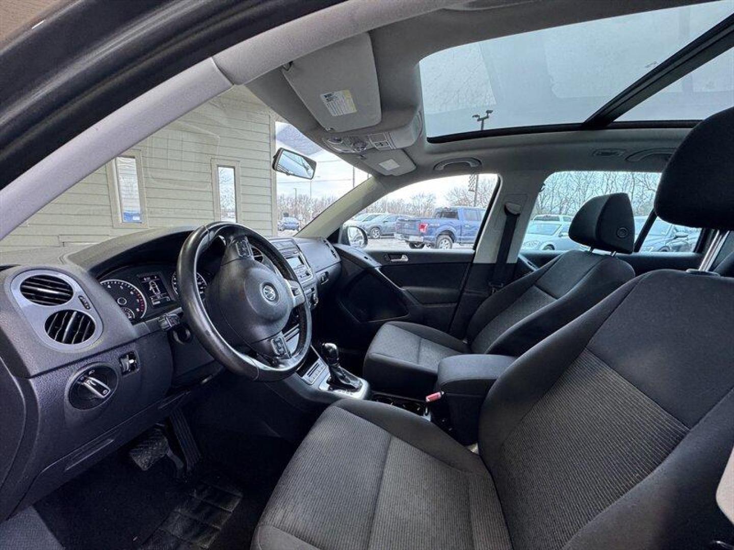 2013 Pepper Gray Volkswagen Tiguan S (WVGAV3AX9DW) with an 2.0L Turbo I4 200hp 207ft. lbs. engine, TipTronic transmission, located at 25355 Eames Street, Channahon, IL, 60410, (815) 467-1807, 41.429108, -88.228432 - 2013 Volkswagen Tiguan S compact, turbocharged, and still flirting with the open road. Under the hood sits VWs peppy 2.0L Turbo I4 pushing a sporty 200 hp and 207 lb-ft of torque, so this little crossover hustles when you want it to and sips fuel when you dont. With under 84,000 miles (thats less t - Photo#11