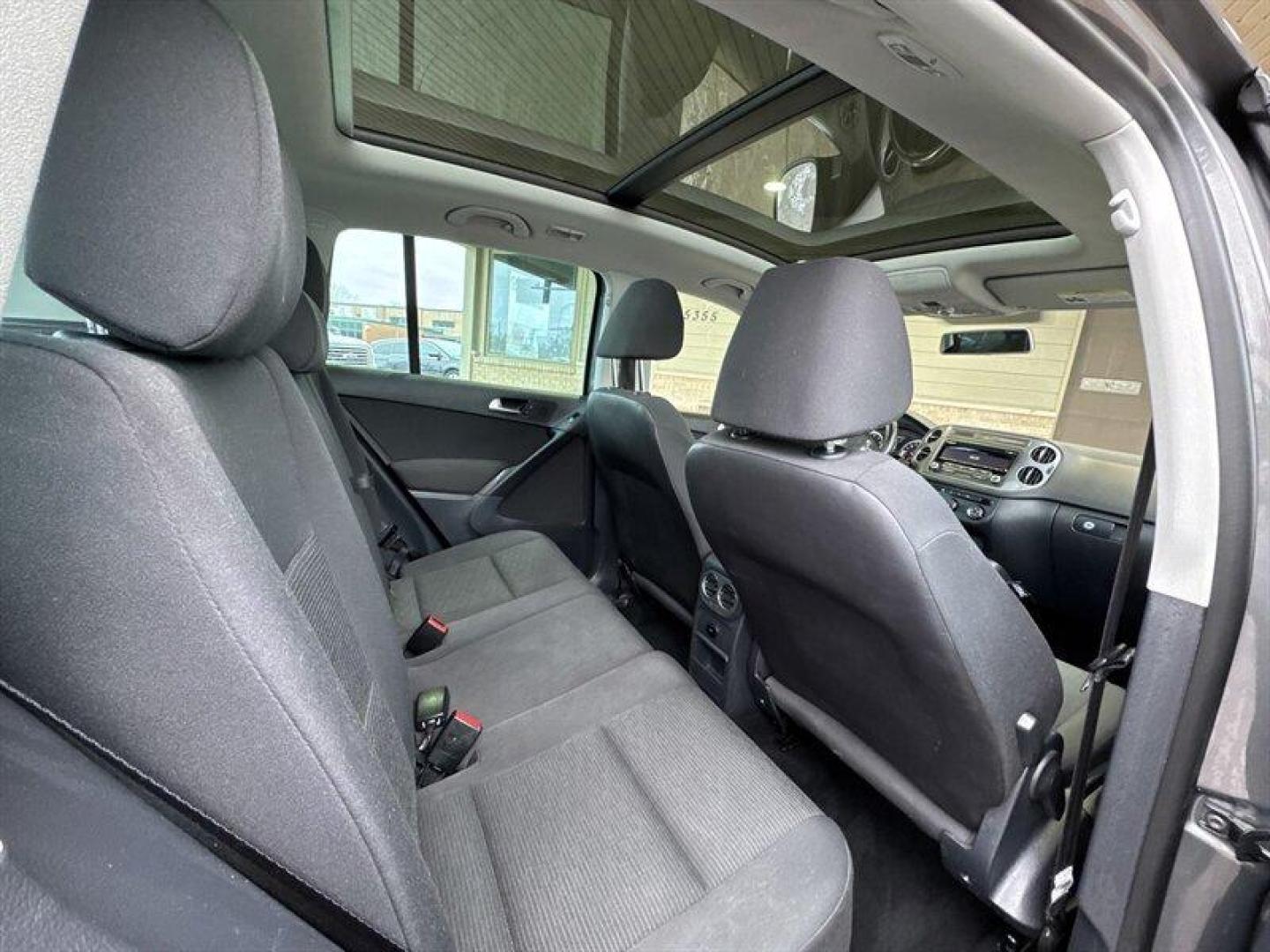 2013 Pepper Gray Volkswagen Tiguan S (WVGAV3AX9DW) with an 2.0L Turbo I4 200hp 207ft. lbs. engine, TipTronic transmission, located at 25355 Eames Street, Channahon, IL, 60410, (815) 467-1807, 41.429108, -88.228432 - 2013 Volkswagen Tiguan S compact, turbocharged, and still flirting with the open road. Under the hood sits VWs peppy 2.0L Turbo I4 pushing a sporty 200 hp and 207 lb-ft of torque, so this little crossover hustles when you want it to and sips fuel when you dont. With under 84,000 miles (thats less t - Photo#14