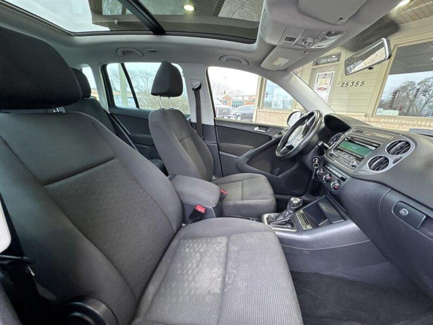 2013 Pepper Gray Volkswagen Tiguan S (WVGAV3AX9DW) with an 2.0L Turbo I4 200hp 207ft. lbs. engine, TipTronic transmission, located at 25355 Eames Street, Channahon, IL, 60410, (815) 467-1807, 41.429108, -88.228432 - 2013 Volkswagen Tiguan S compact, turbocharged, and still flirting with the open road. Under the hood sits VWs peppy 2.0L Turbo I4 pushing a sporty 200 hp and 207 lb-ft of torque, so this little crossover hustles when you want it to and sips fuel when you dont. With under 84,000 miles (thats less t - Photo#15