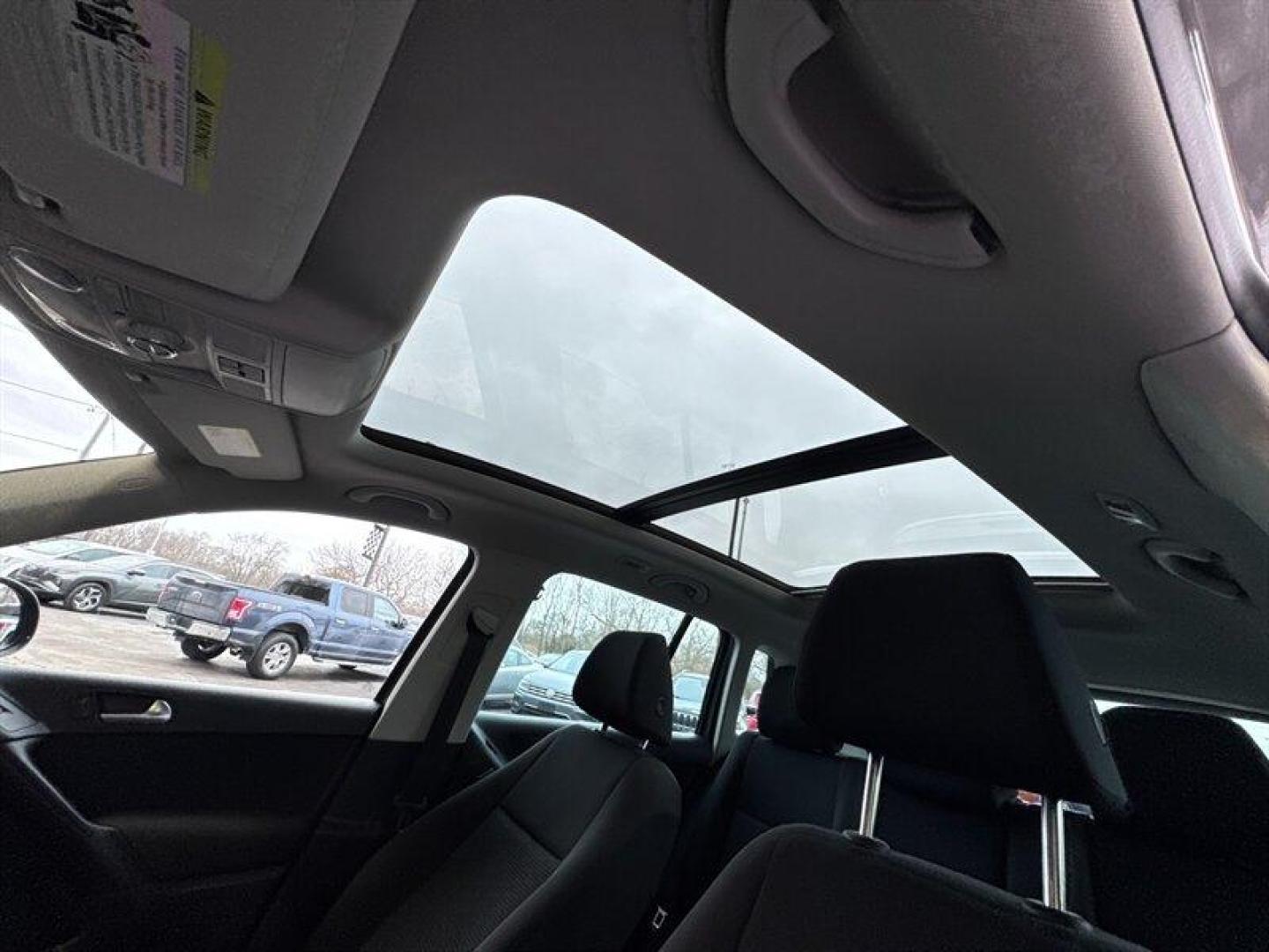 2013 Pepper Gray Volkswagen Tiguan S (WVGAV3AX9DW) with an 2.0L Turbo I4 200hp 207ft. lbs. engine, TipTronic transmission, located at 25355 Eames Street, Channahon, IL, 60410, (815) 467-1807, 41.429108, -88.228432 - 2013 Volkswagen Tiguan S compact, turbocharged, and still flirting with the open road. Under the hood sits VWs peppy 2.0L Turbo I4 pushing a sporty 200 hp and 207 lb-ft of torque, so this little crossover hustles when you want it to and sips fuel when you dont. With under 84,000 miles (thats less t - Photo#17