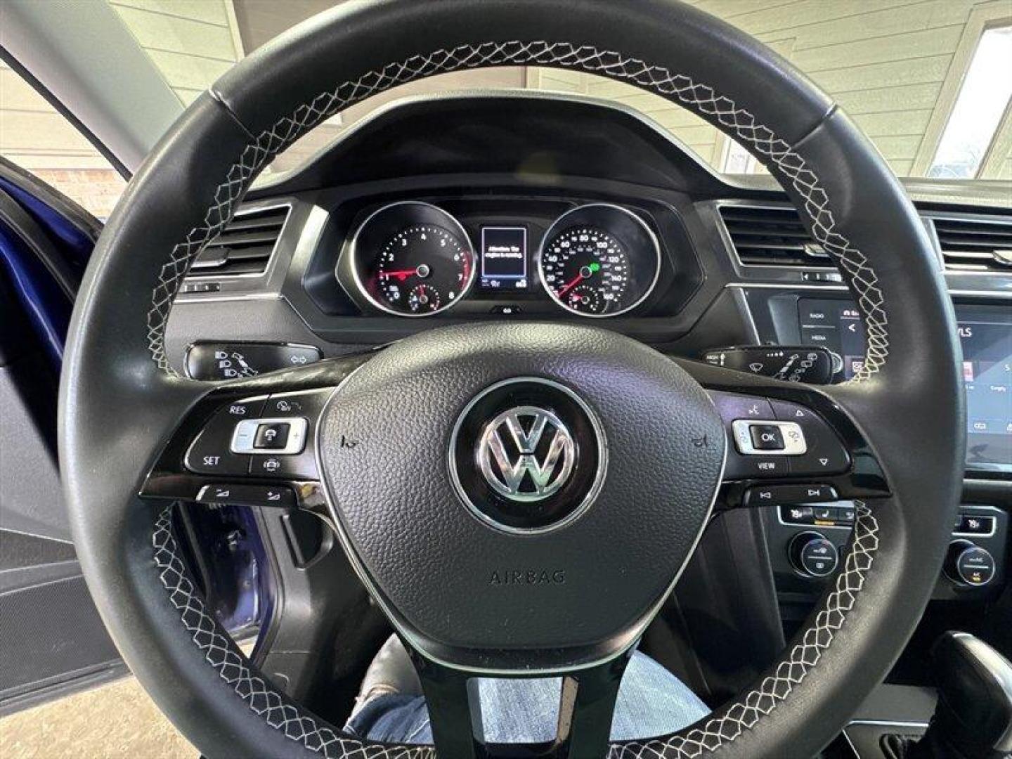 2021 Stone Blue Metallic Volkswagen Tiguan 2.0T SE (3VV2B7AX0MM) with an 2.0L Turbo I4 184hp 221ft. lbs. engine, TipTronic transmission, located at 25355 Eames Street, Channahon, IL, 60410, (815) 467-1807, 41.429108, -88.228432 - Meet your new not-so-humble compact SUV: a 2021 Volkswagen Tiguan SE 4MOTION thats got the looks, the brains, and the all-wheel-drive attitude to handle whatever you throw at it in style. Under the hood its sporting the pep you asked for: a 2.0L Turbo I4 putting out 184 hp and 221 ft-lbs of torque, - Photo#25