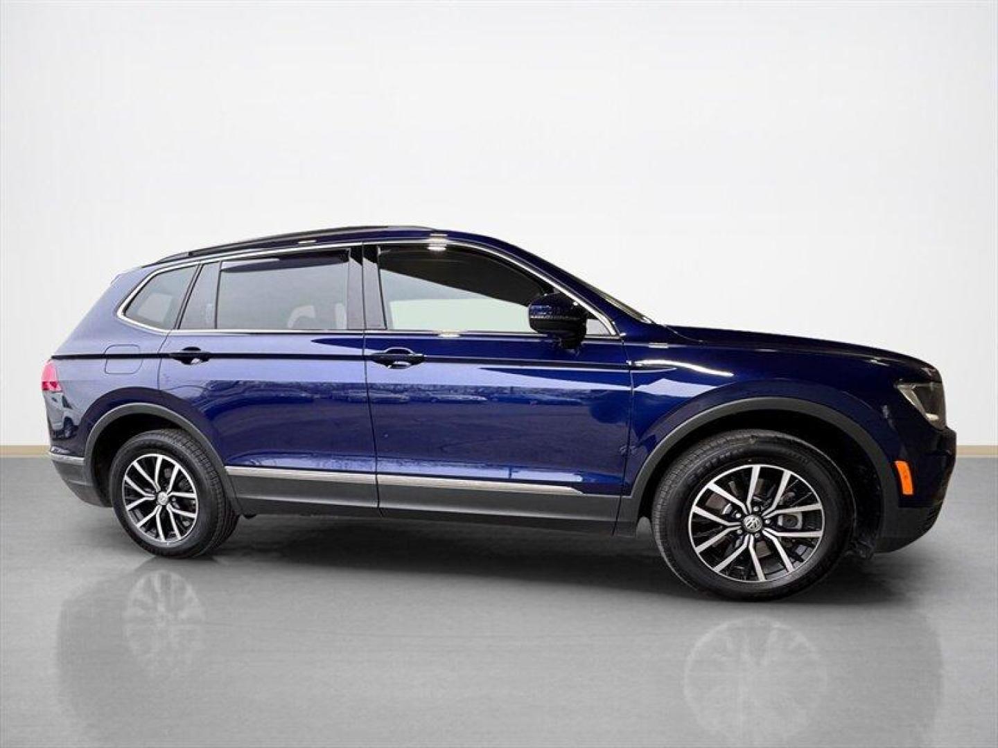 2021 Stone Blue Metallic Volkswagen Tiguan 2.0T SE (3VV2B7AX0MM) with an 2.0L Turbo I4 184hp 221ft. lbs. engine, TipTronic transmission, located at 25355 Eames Street, Channahon, IL, 60410, (815) 467-1807, 41.429108, -88.228432 - Meet your new not-so-humble compact SUV: a 2021 Volkswagen Tiguan SE 4MOTION thats got the looks, the brains, and the all-wheel-drive attitude to handle whatever you throw at it in style. Under the hood its sporting the pep you asked for: a 2.0L Turbo I4 putting out 184 hp and 221 ft-lbs of torque, - Photo#1