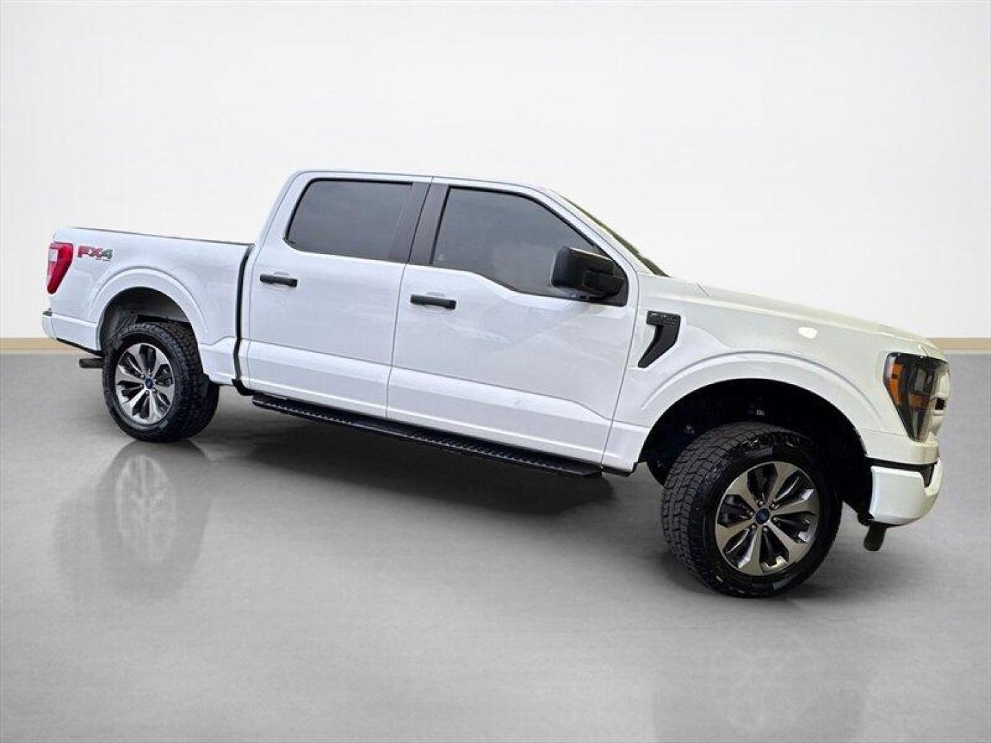 2023 Oxford White Ford F-150 XL (1FTFW1E56PF) with an 5.0L Flex Fuel V8 400hp 410ft. lbs. engine, Automatic transmission, located at 25355 Eames Street, Channahon, IL, 60410, (815) 467-1807, 41.429108, -88.228432 - 2023 Ford F-150 STX FX4 Oxford White exterior, Medium Dark Slate interior. Overview This 2023 F-150 STX equipped with the FX4 Off-Road Package is powered by Fords 5.0L Flex-Fuel V8, delivering 400 hp and 410 lb-ft of torque. It pairs with Fords automatic transmission and a 4x4 drivetrain tuned for - Photo#1