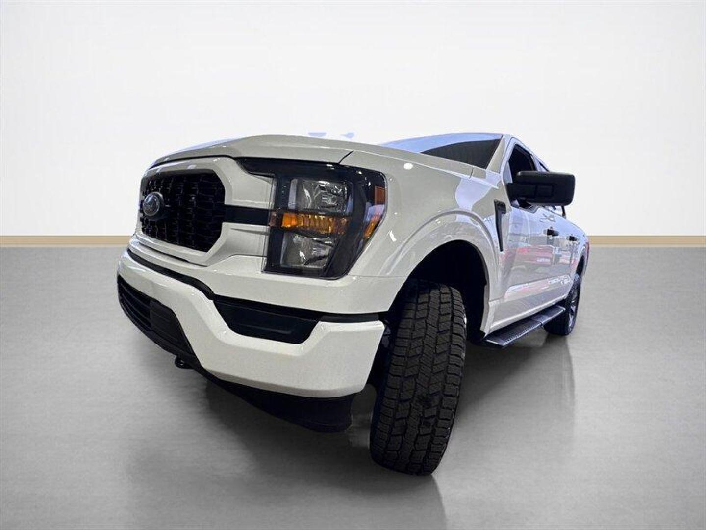 2023 Oxford White Ford F-150 XL (1FTFW1E56PF) with an 5.0L Flex Fuel V8 400hp 410ft. lbs. engine, Automatic transmission, located at 25355 Eames Street, Channahon, IL, 60410, (815) 467-1807, 41.429108, -88.228432 - 2023 Ford F-150 STX FX4 Oxford White exterior, Medium Dark Slate interior. Overview This 2023 F-150 STX equipped with the FX4 Off-Road Package is powered by Fords 5.0L Flex-Fuel V8, delivering 400 hp and 410 lb-ft of torque. It pairs with Fords automatic transmission and a 4x4 drivetrain tuned for - Photo#7