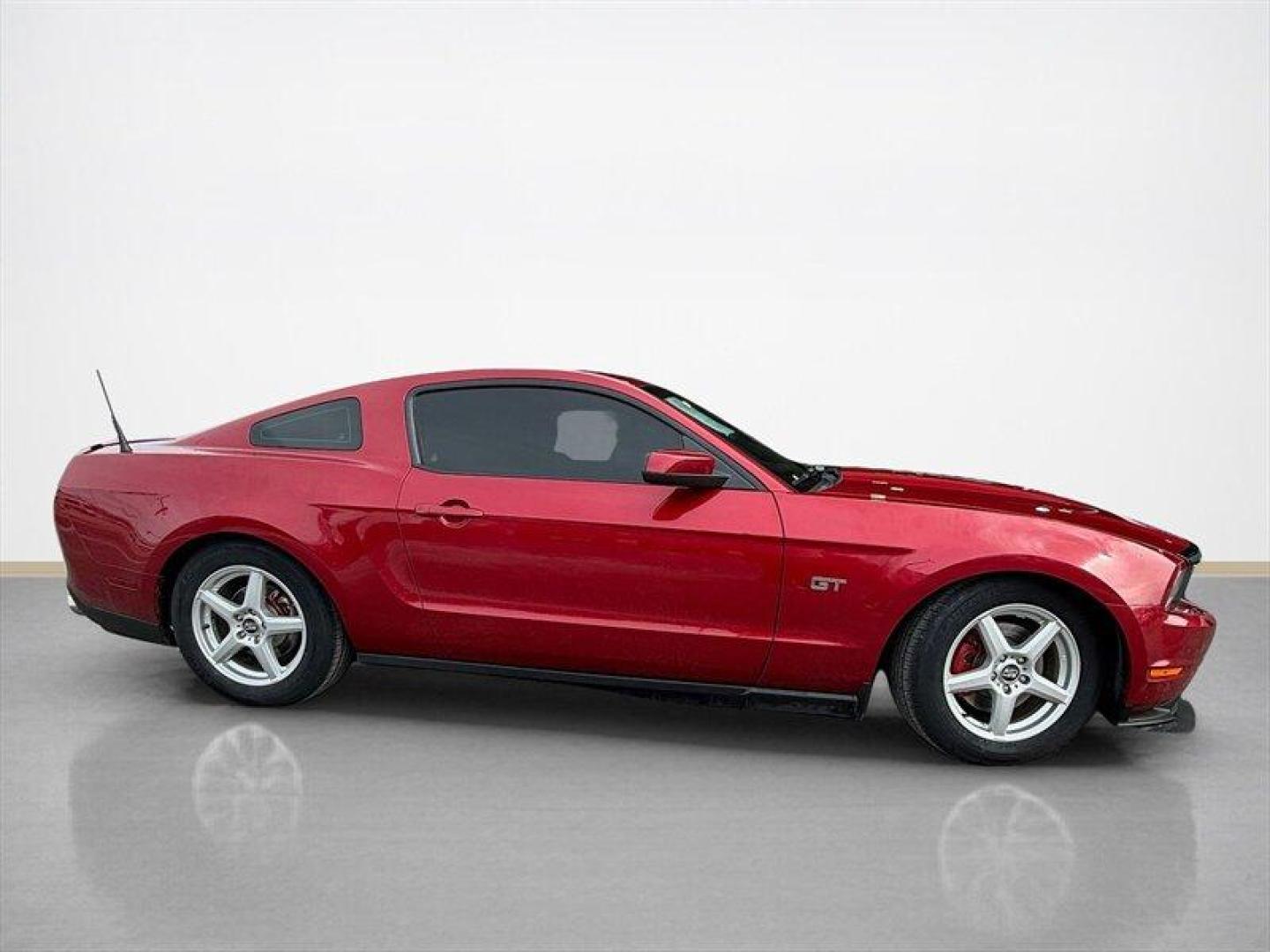 2010 Torch Red Ford Mustang GT (1ZVBP8CH5A5) with an 4.6L V8 315hp 325ft. lbs. engine, 5 Speed Manual transmission, located at 25355 Eames Street, Channahon, IL, 60410, (815) 467-1807, 41.429108, -88.228432 - ** THIS MUSTANG IS LIGHTLY MODIFIED INCLUDING A MILD CAM, HURST SHORT THROW SHIFTER, EXHAUST, AND SUSPENSION MODS. ** 2010 Ford Mustang GT Torch Red exterior with Charcoal Black interior. Powered by the factory 4.6L V8 (3-valve) producing 315 hp and 325 lb-ft of torque, this Mustang GT delivers cla - Photo#1