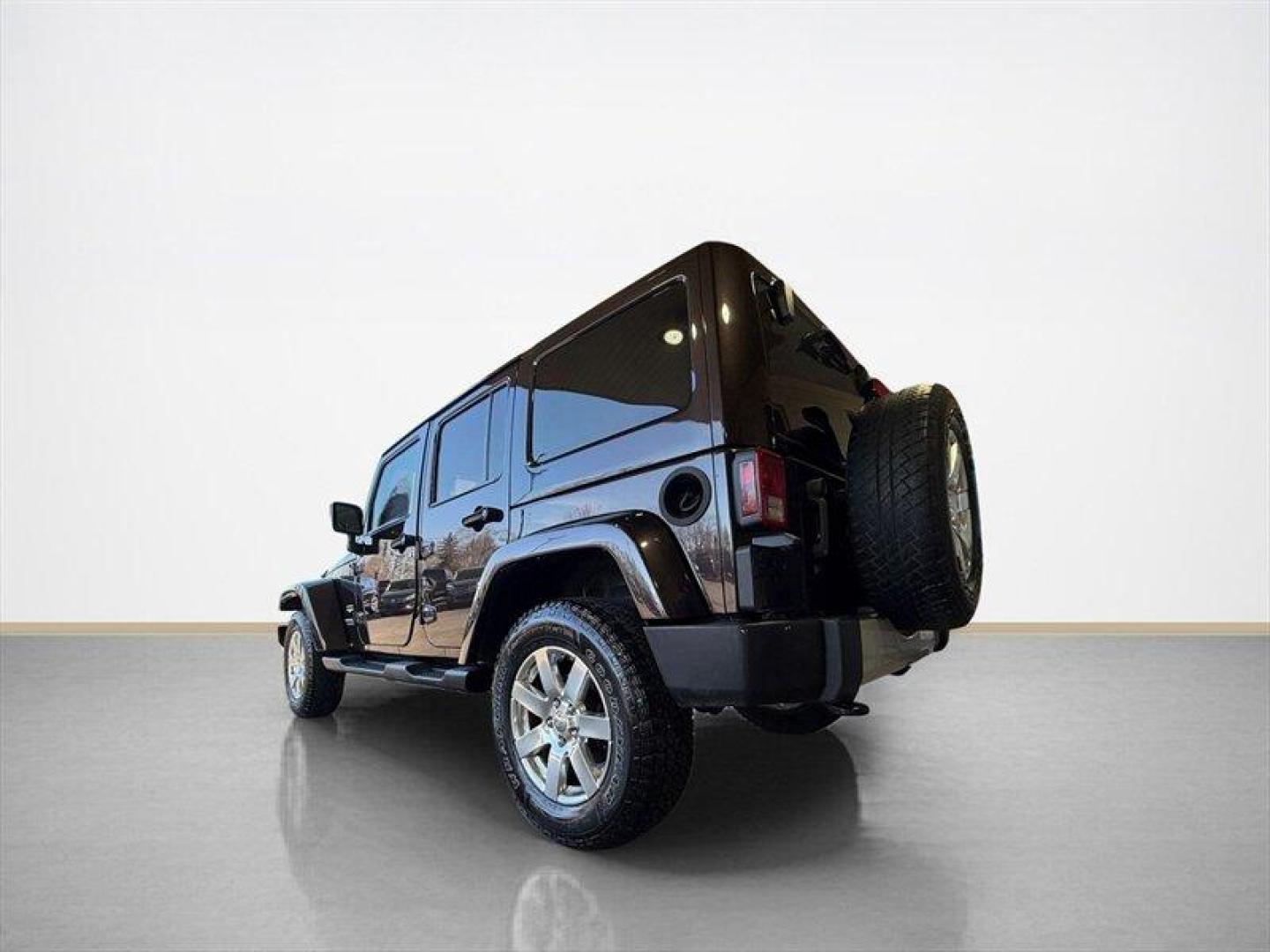 2013 Rugged Brown Pearl Coat Jeep Wrangler Unlimited Sahara (1C4HJWEG9DL) with an 3.6L V6 285hp 260ft. lbs. engine, Automatic transmission, located at 25355 Eames Street, Channahon, IL, 60410, (815) 467-1807, 41.429108, -88.228432 - Meet your next adventure buddy: a 2013 Jeep Wrangler Unlimited Sahara with the thirsty-for-fun 3.6L V6 (285 hp, 260 lb-ft). This is the four-door Wrangler that says weekend warrior loud and proud and yes, it actually looks as good in mud as it does in the city. Whats special here: - Dual Top Group - Photo#5