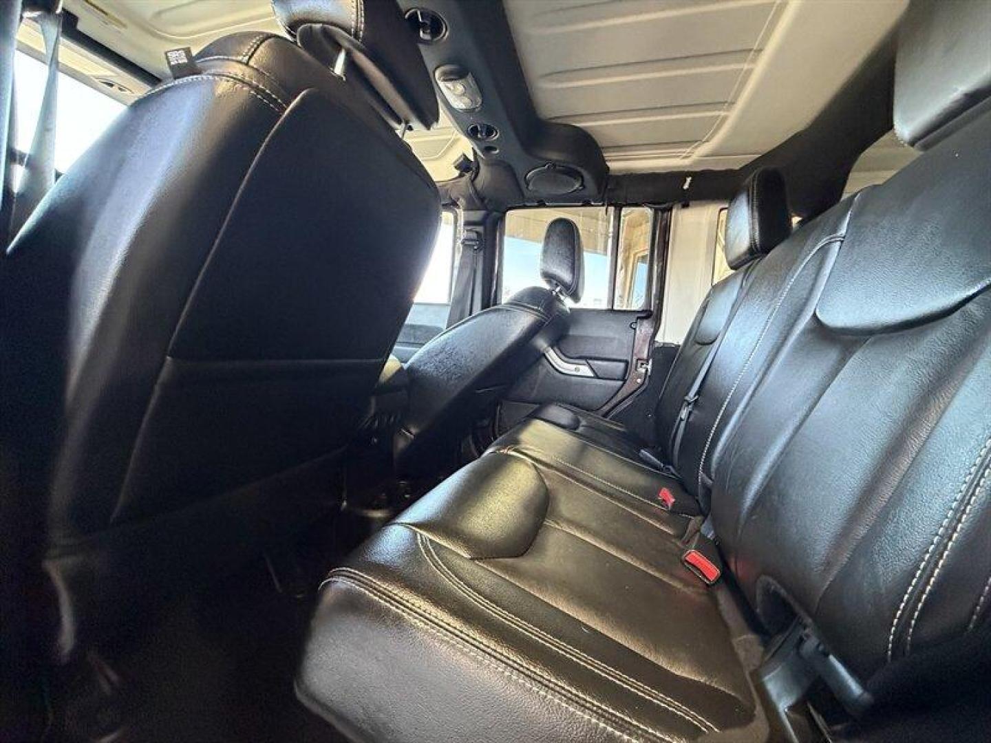 2013 Rugged Brown Pearl Coat Jeep Wrangler Unlimited Sahara (1C4HJWEG9DL) with an 3.6L V6 285hp 260ft. lbs. engine, Automatic transmission, located at 25355 Eames Street, Channahon, IL, 60410, (815) 467-1807, 41.429108, -88.228432 - Meet your next adventure buddy: a 2013 Jeep Wrangler Unlimited Sahara with the thirsty-for-fun 3.6L V6 (285 hp, 260 lb-ft). This is the four-door Wrangler that says weekend warrior loud and proud and yes, it actually looks as good in mud as it does in the city. Whats special here: - Dual Top Group - Photo#11