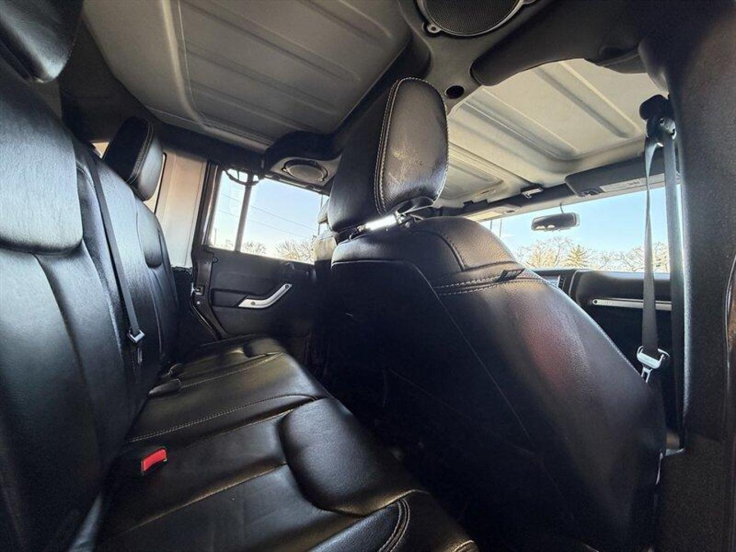 2013 Rugged Brown Pearl Coat Jeep Wrangler Unlimited Sahara (1C4HJWEG9DL) with an 3.6L V6 285hp 260ft. lbs. engine, Automatic transmission, located at 25355 Eames Street, Channahon, IL, 60410, (815) 467-1807, 41.429108, -88.228432 - Meet your next adventure buddy: a 2013 Jeep Wrangler Unlimited Sahara with the thirsty-for-fun 3.6L V6 (285 hp, 260 lb-ft). This is the four-door Wrangler that says weekend warrior loud and proud and yes, it actually looks as good in mud as it does in the city. Whats special here: - Dual Top Group - Photo#12