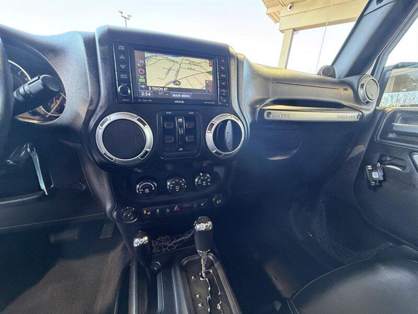 2013 Rugged Brown Pearl Coat Jeep Wrangler Unlimited Sahara (1C4HJWEG9DL) with an 3.6L V6 285hp 260ft. lbs. engine, Automatic transmission, located at 25355 Eames Street, Channahon, IL, 60410, (815) 467-1807, 41.429108, -88.228432 - Meet your next adventure buddy: a 2013 Jeep Wrangler Unlimited Sahara with the thirsty-for-fun 3.6L V6 (285 hp, 260 lb-ft). This is the four-door Wrangler that says weekend warrior loud and proud and yes, it actually looks as good in mud as it does in the city. Whats special here: - Dual Top Group - Photo#14