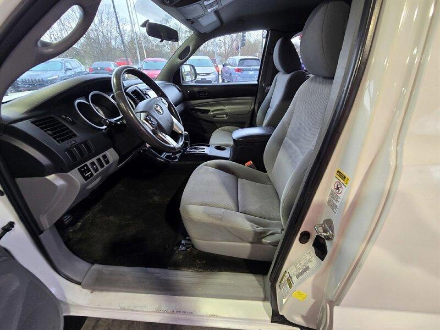 2015 Super White Toyota Tacoma (5TFUX4EN8FX) with an 2.7L I4 159hp 180ft. lbs. engine, Automatic transmission, located at 25355 Eames Street, Channahon, IL, 60410, (815) 467-1807, 41.429108, -88.228432 - This 2015 Toyota Tacoma is built to take over the road no apologies. Super White exterior, Graphite interior, and a gutsy 2.7L I4 pumping out 159 horsepower and 180 lb-ft of torque. Its lean, its mean, and itll get you where you need to go with a measured appetite: 18 MPG city and 20 MPG highway. T - Photo#9