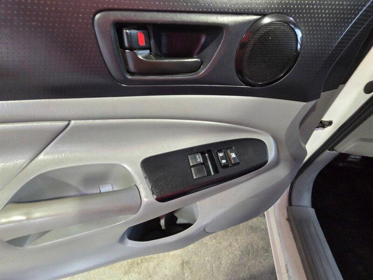 2015 Super White Toyota Tacoma (5TFUX4EN8FX) with an 2.7L I4 159hp 180ft. lbs. engine, Automatic transmission, located at 25355 Eames Street, Channahon, IL, 60410, (815) 467-1807, 41.429108, -88.228432 - This 2015 Toyota Tacoma is built to take over the road no apologies. Super White exterior, Graphite interior, and a gutsy 2.7L I4 pumping out 159 horsepower and 180 lb-ft of torque. Its lean, its mean, and itll get you where you need to go with a measured appetite: 18 MPG city and 20 MPG highway. T - Photo#11